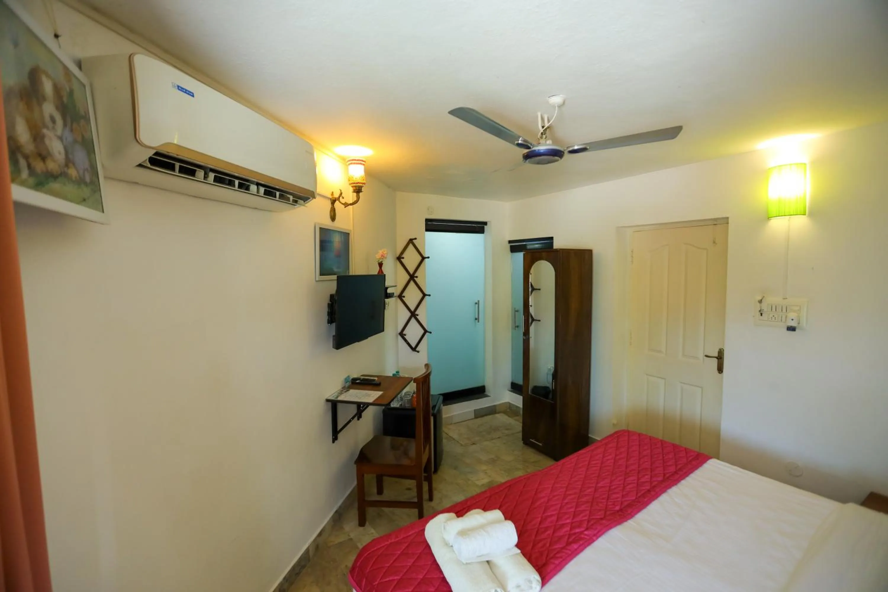 TV and multimedia, Bed in Le Clarisse Guest House