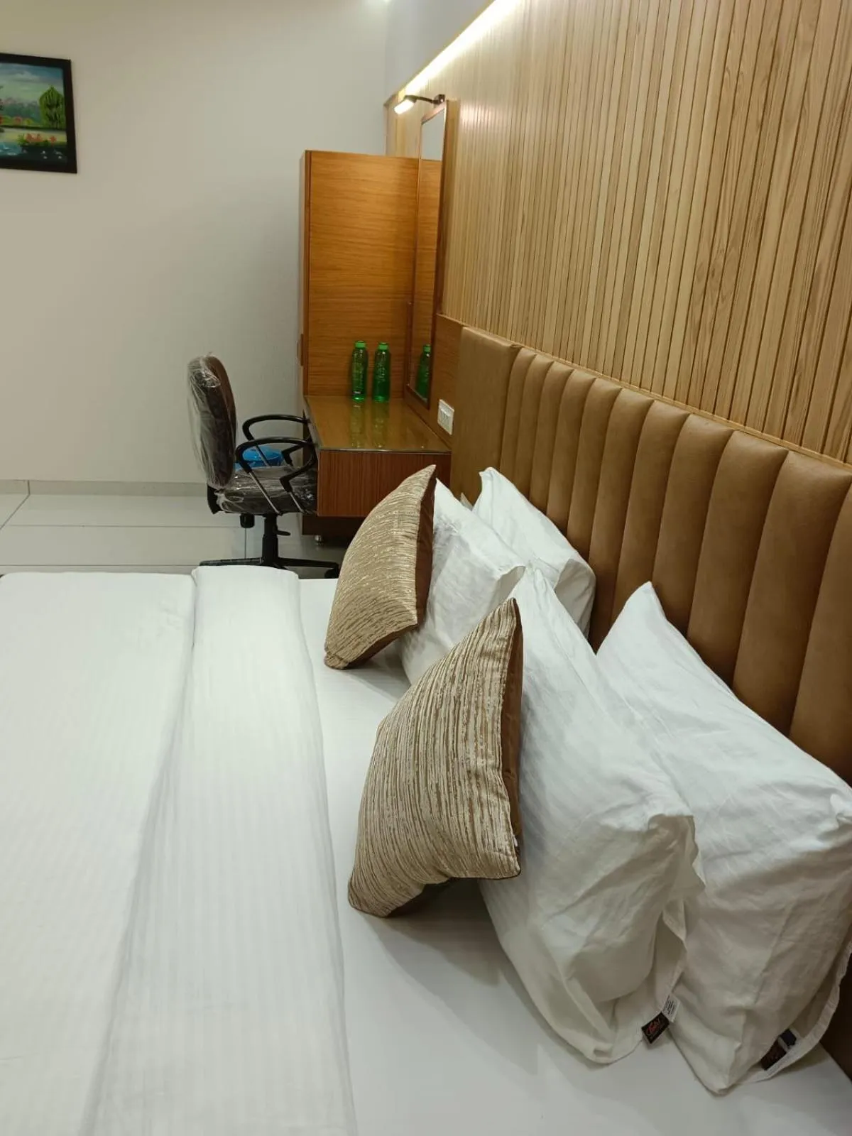 Bed in Tulsi Hotel