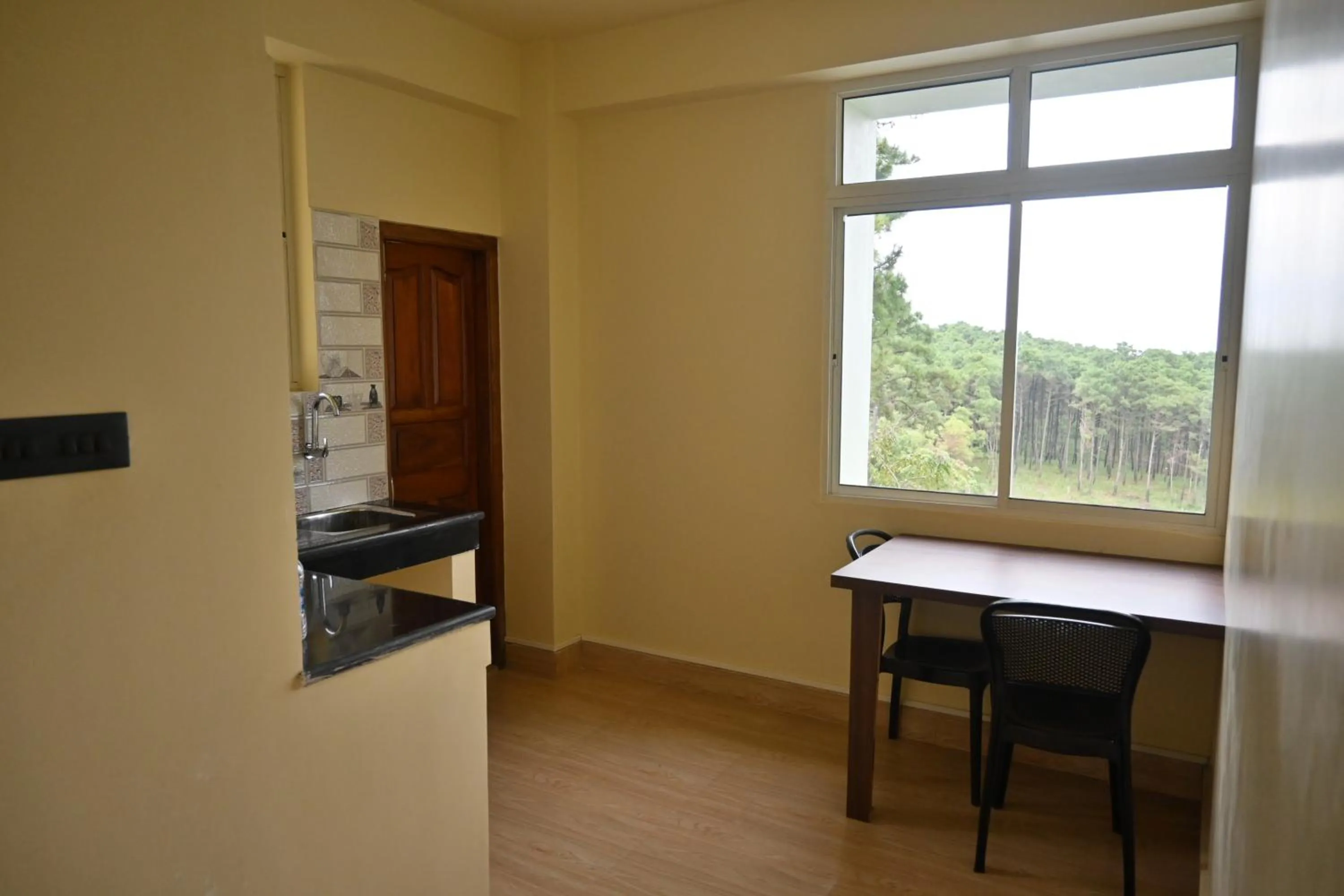 Dining area in TreeTops Residency