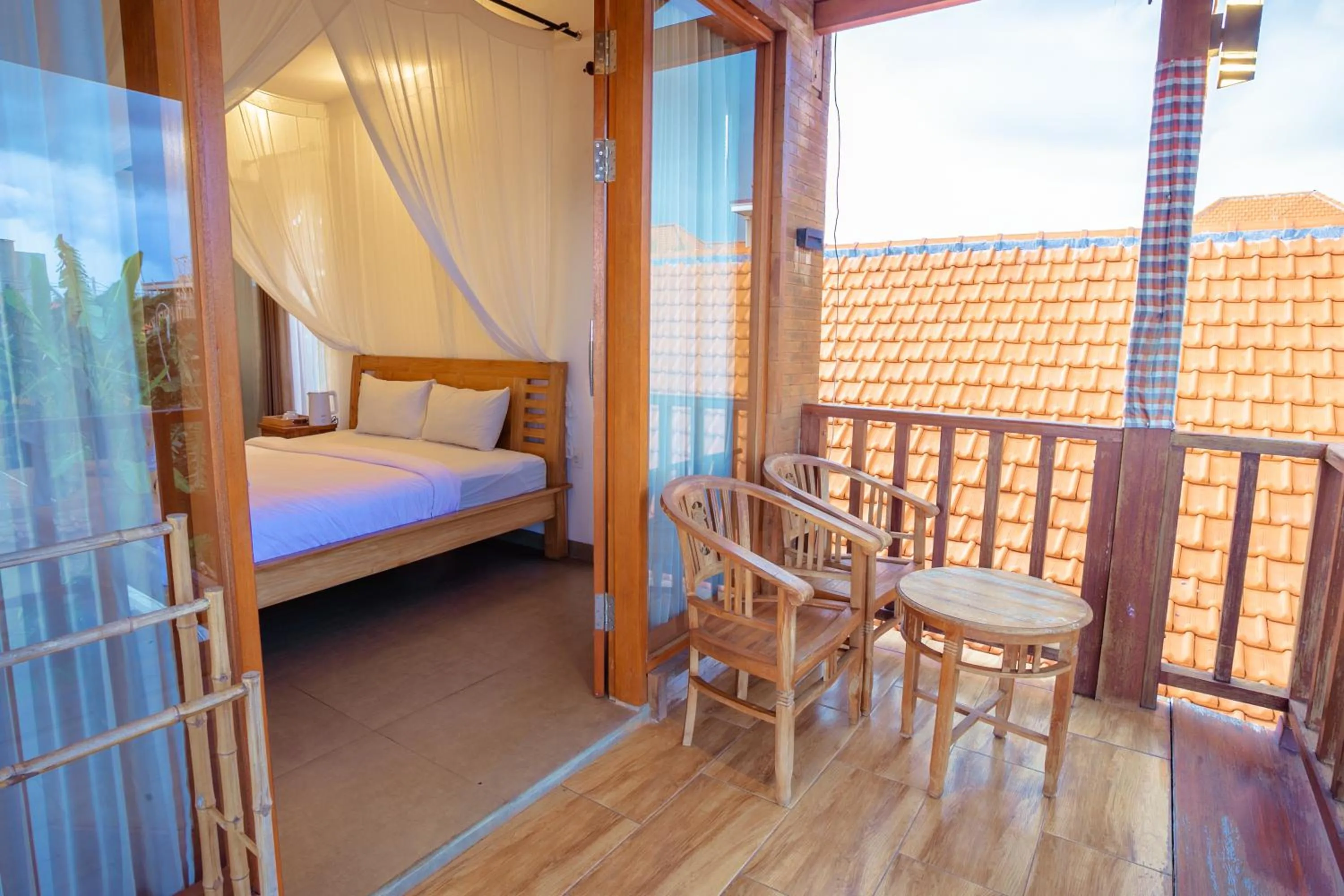 Balcony/Terrace, Bed in Kubu D'Carik Villa & Bungalow by ecommerceloka