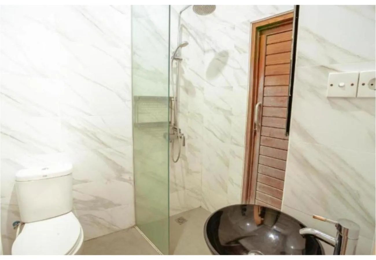 Shower in Kubu D'Carik Villa & Bungalow by ecommerceloka