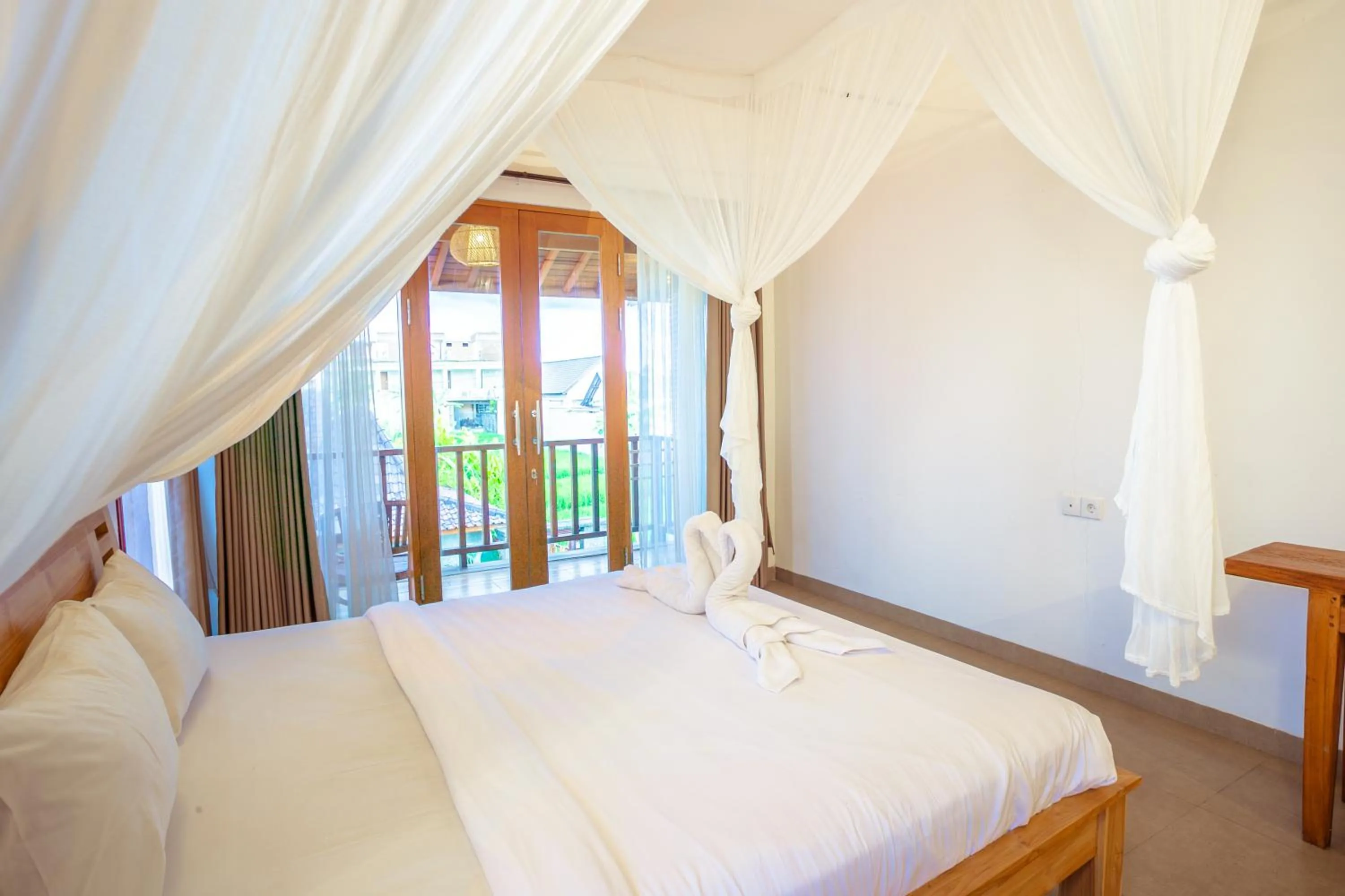 Bed in Kubu D'Carik Villa & Bungalow by ecommerceloka