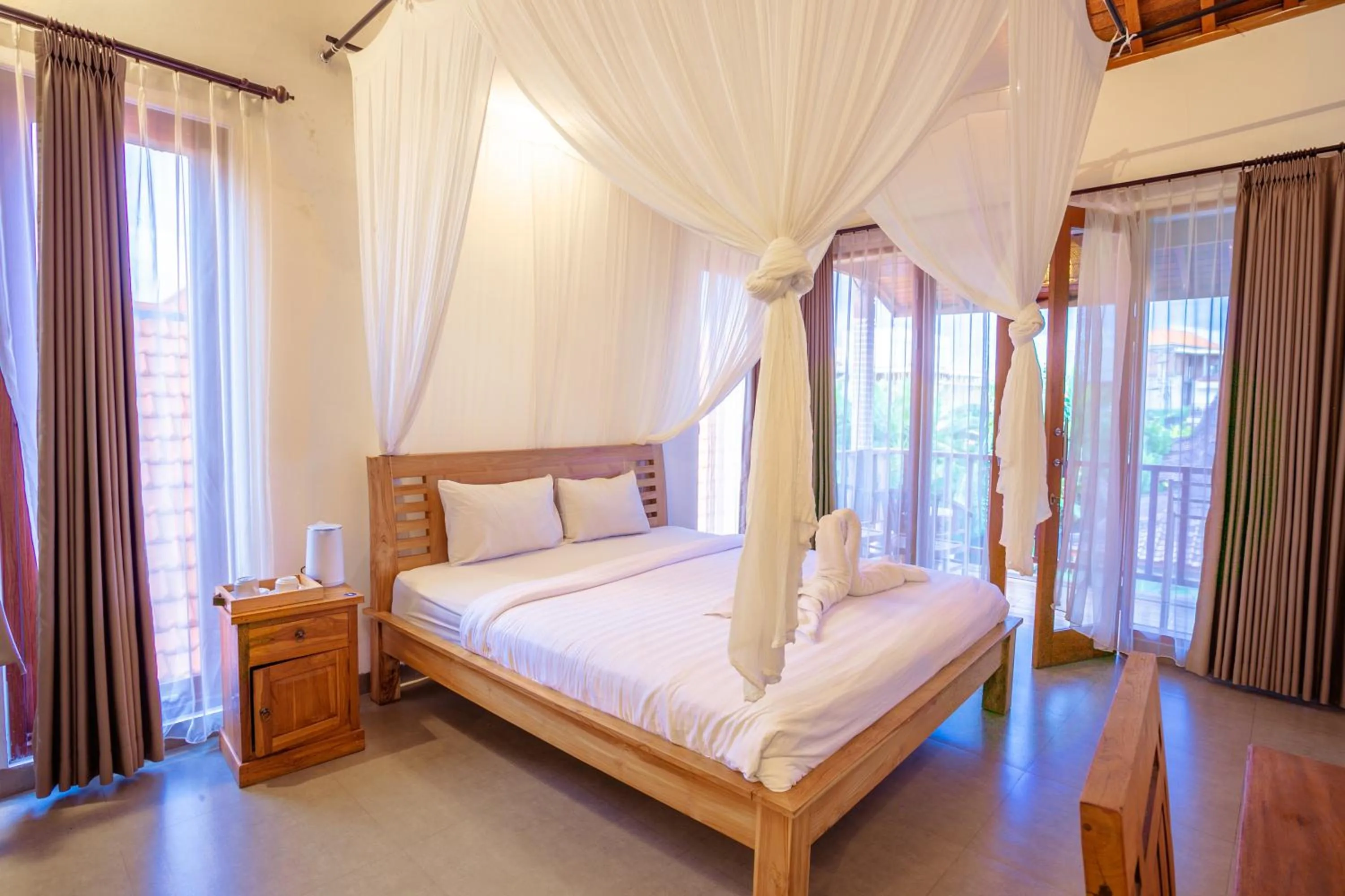 Bed in Kubu D'Carik Villa & Bungalow by ecommerceloka