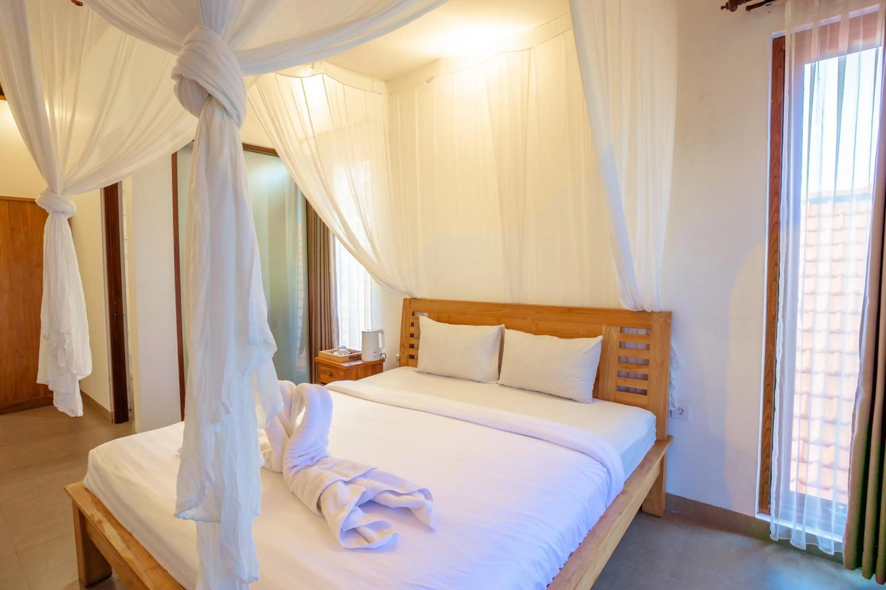 Bed in Kubu D'Carik Villa & Bungalow by ecommerceloka