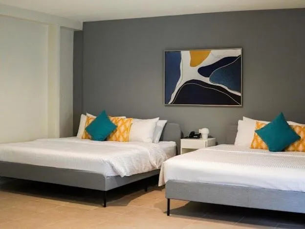 Bed in Emerald Manor Hotel