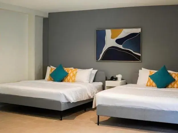 Bed in Emerald Manor Hotel Bed in Emerald Manor Hotel