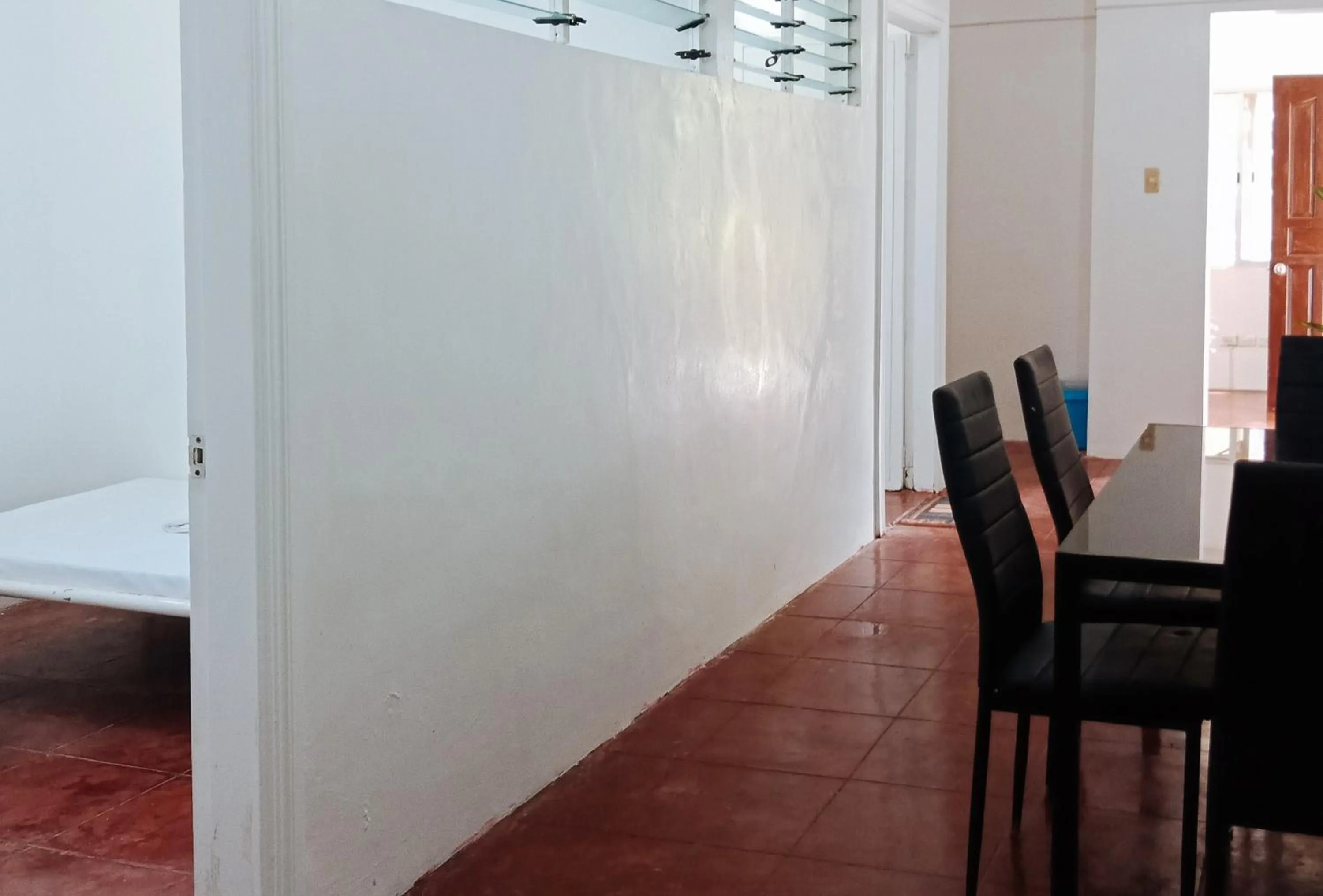 Dining area, Bed in RedDoorz @ Southern Suites Guimaras