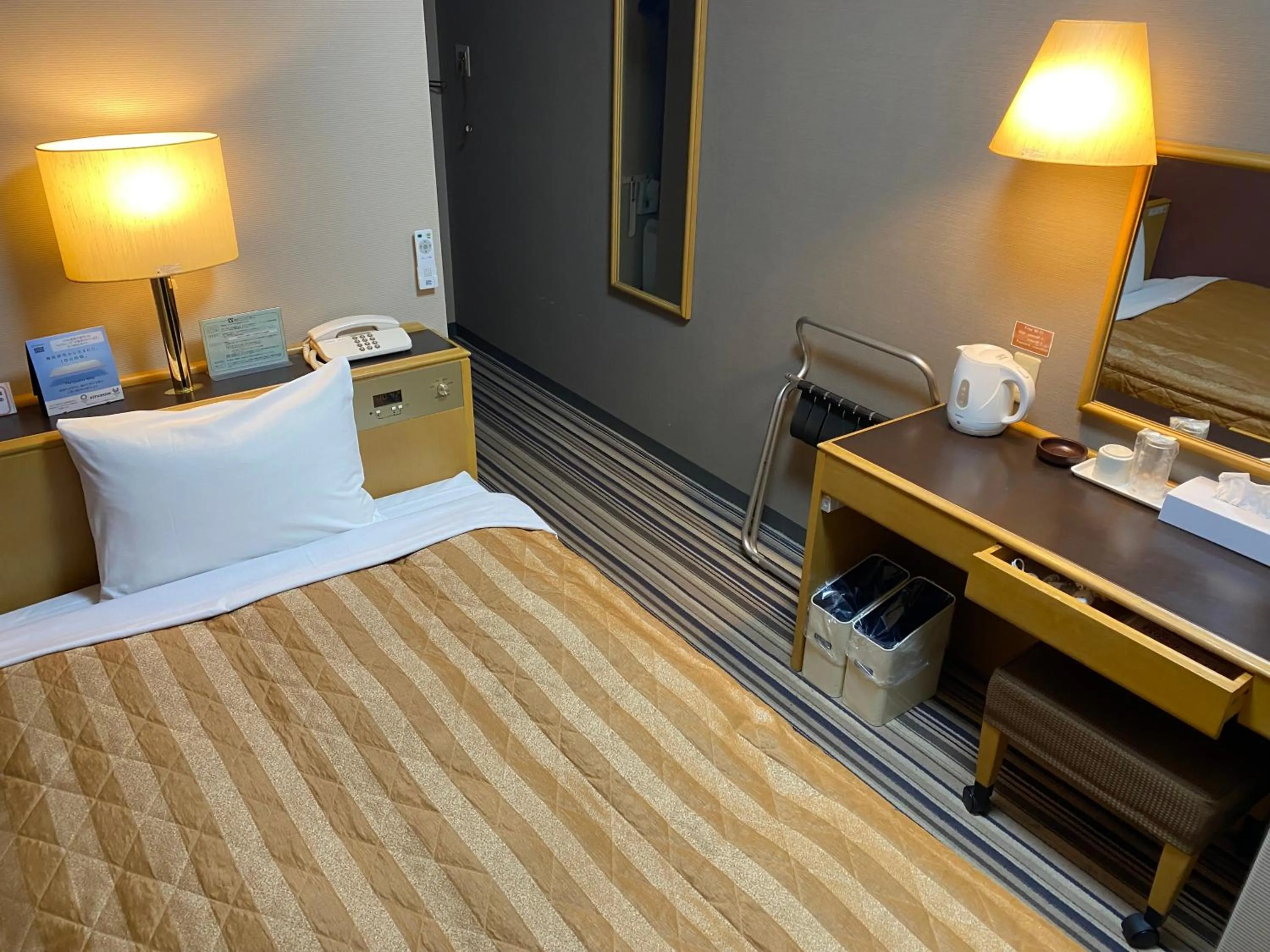 Photo of the whole room, Bed in Hotel Crown Hills Furukawa