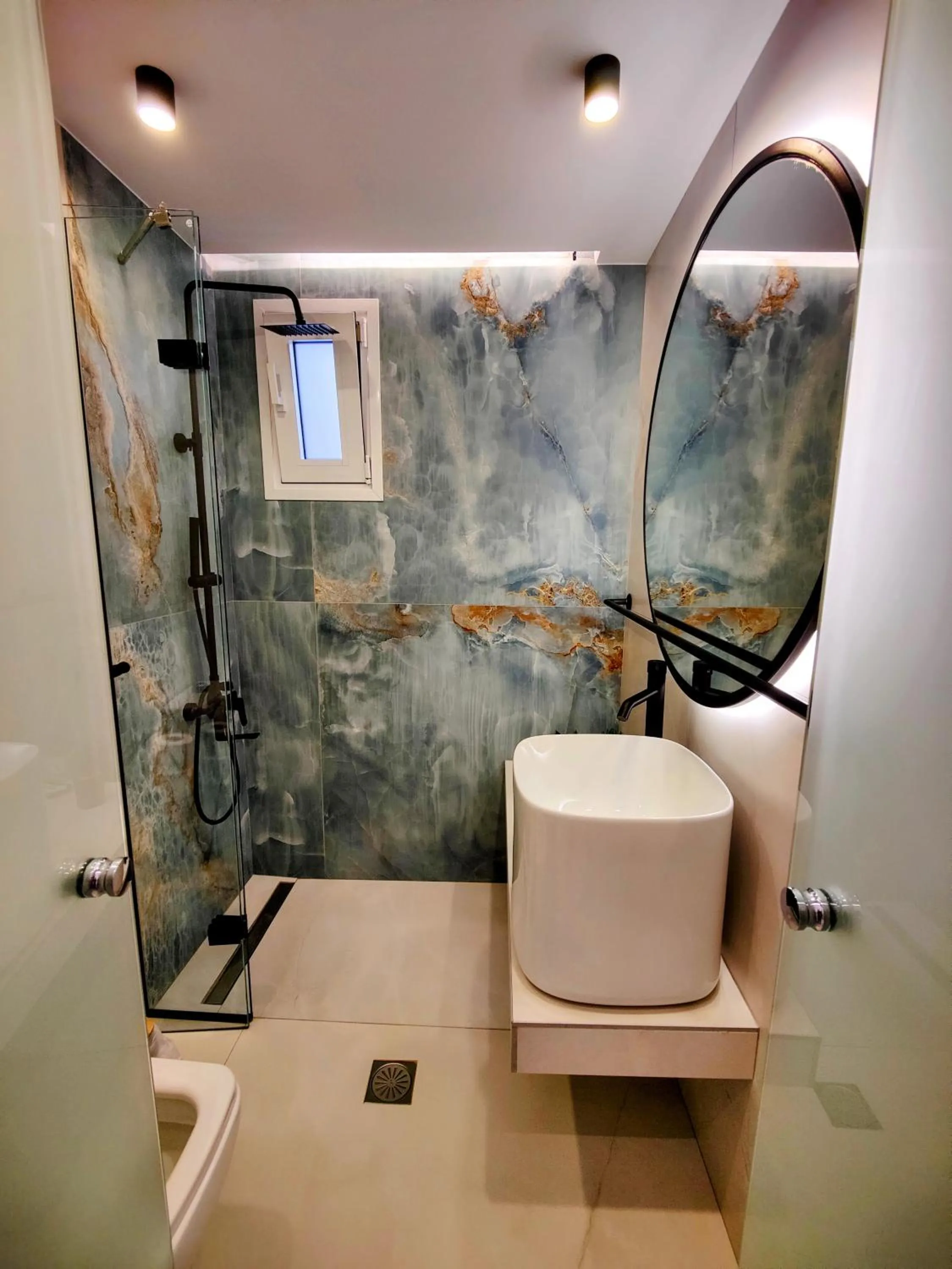 Shower in Aelia Apartments