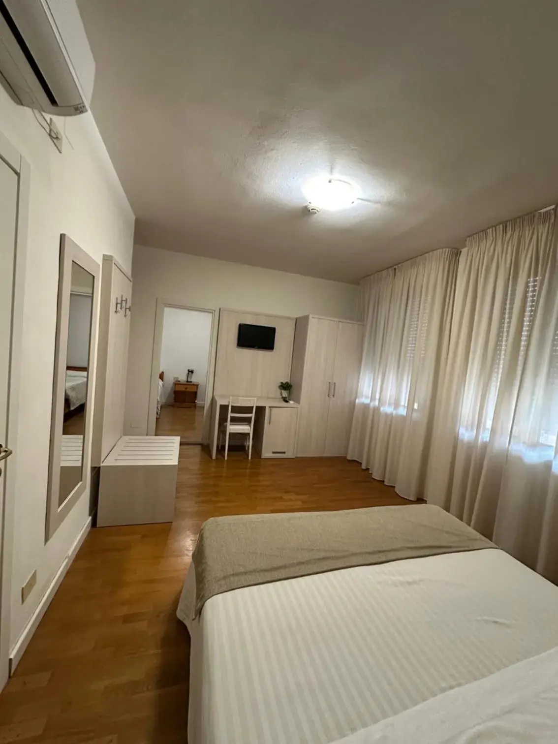 Bed in Hotel La Pace Bed in Hotel La Pace