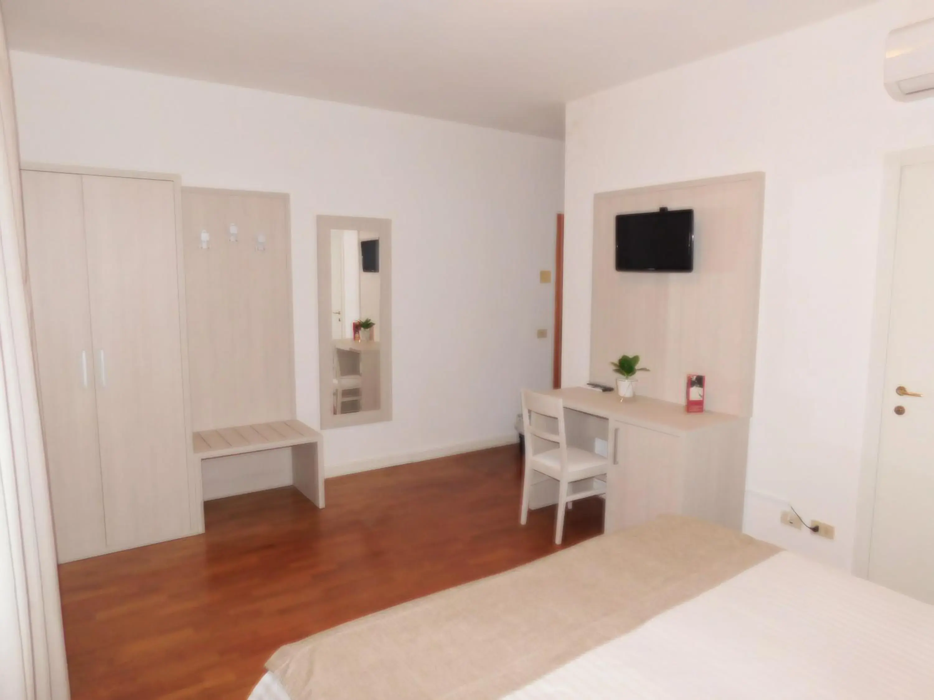 Bed in Hotel La Pace Bed in Hotel La Pace