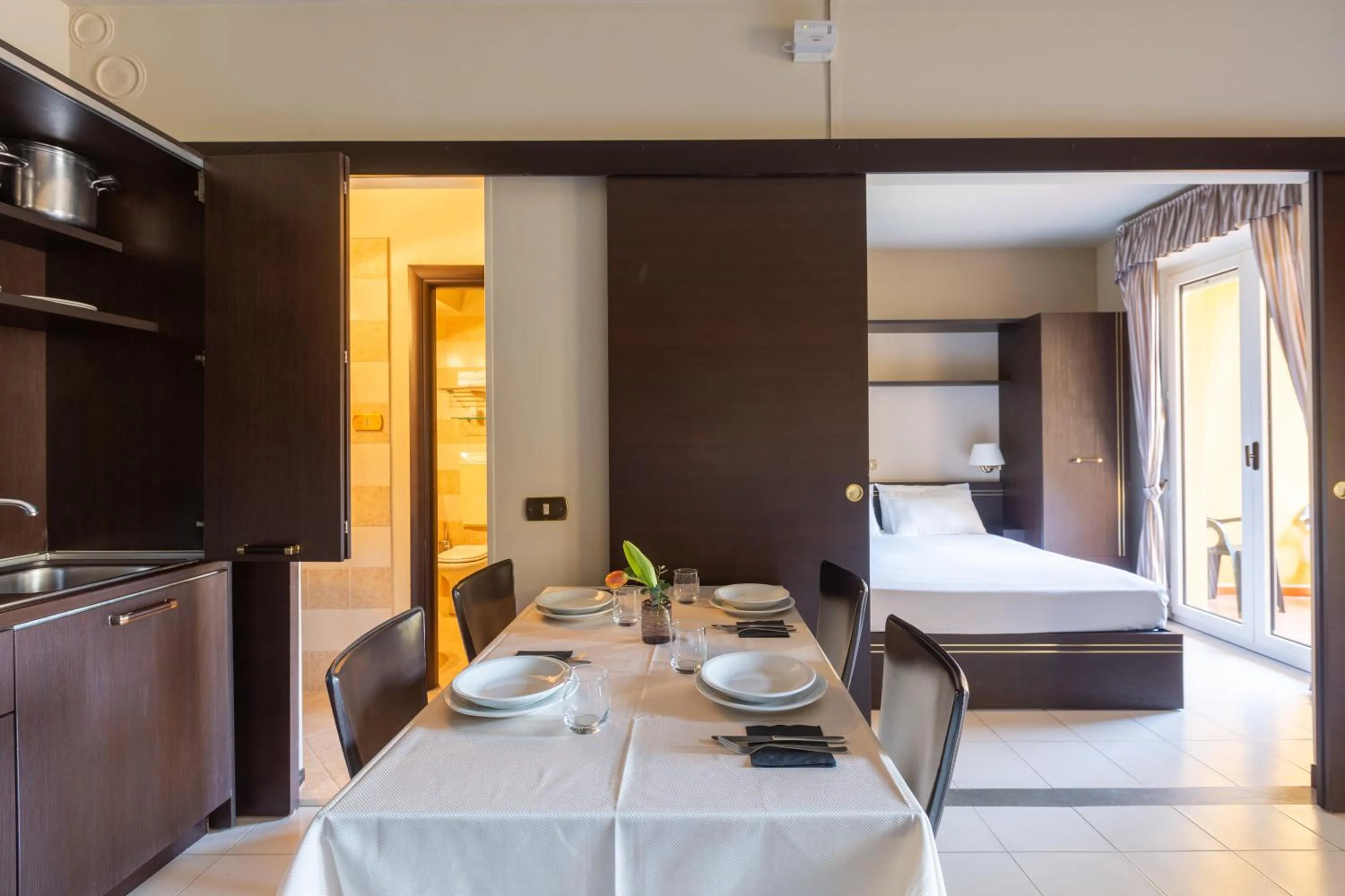 Kitchen or kitchenette, Bed in Loano 2 Village