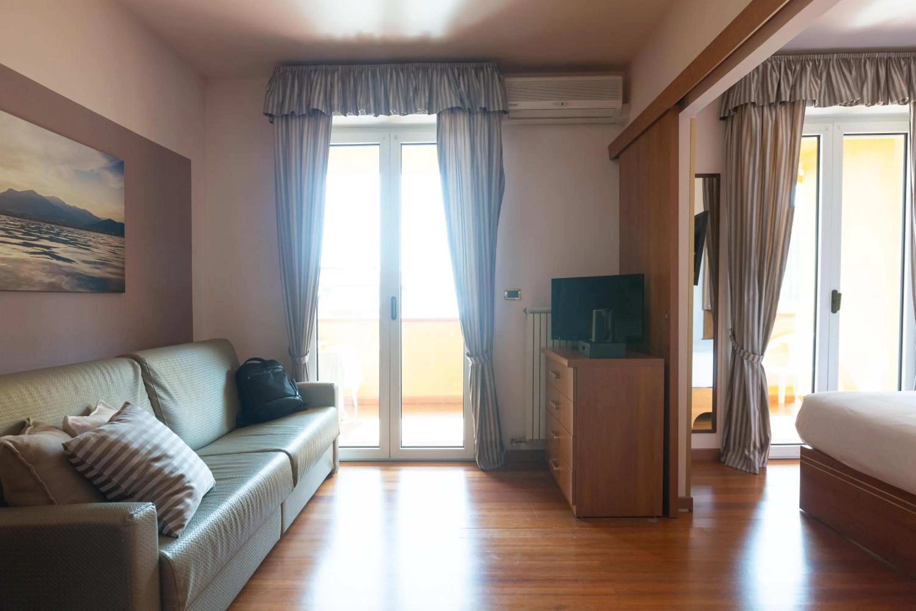 Living room, Bed in Loano 2 Village