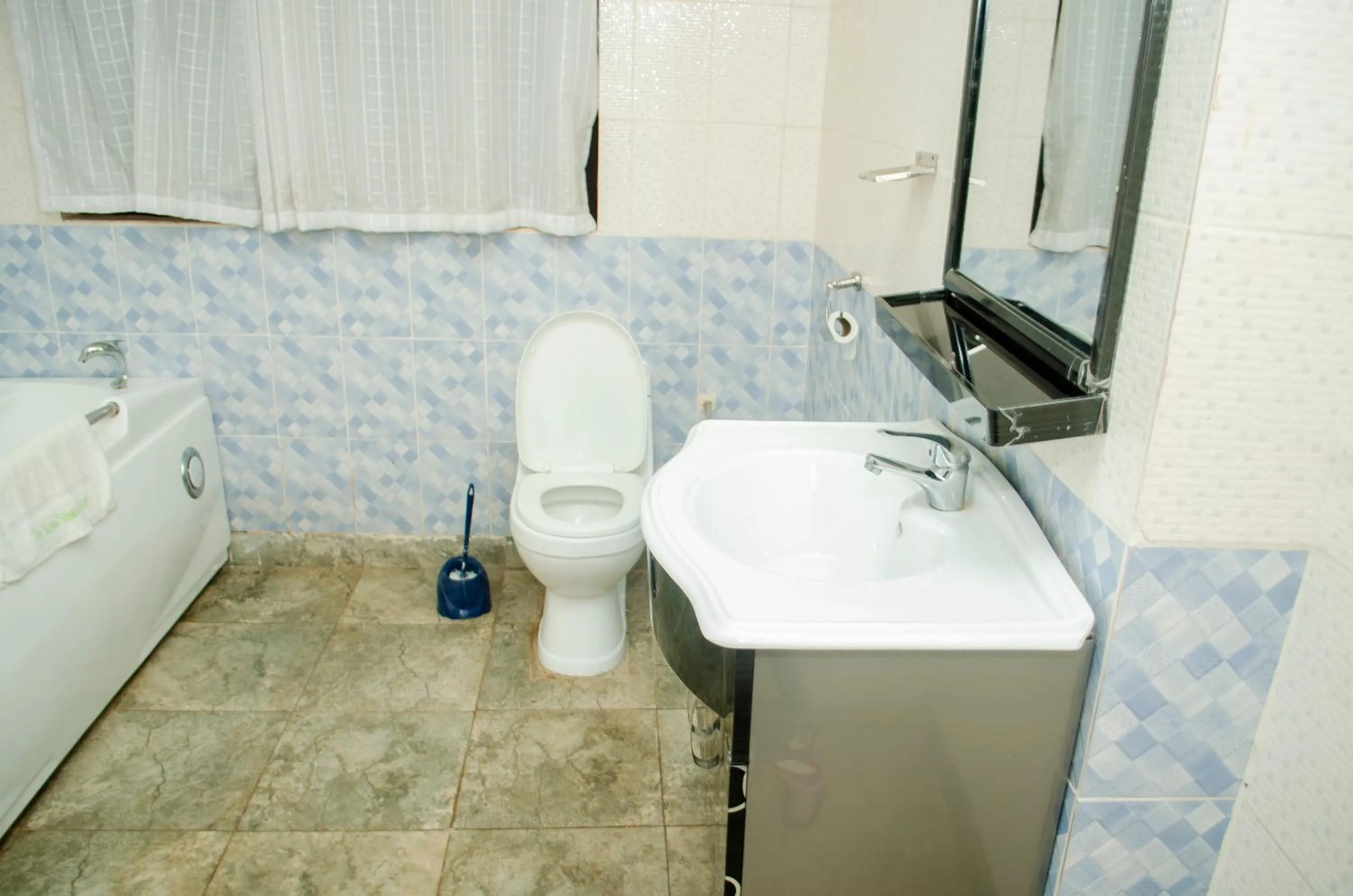Toilet in ROYAL SHALOM HOTEL