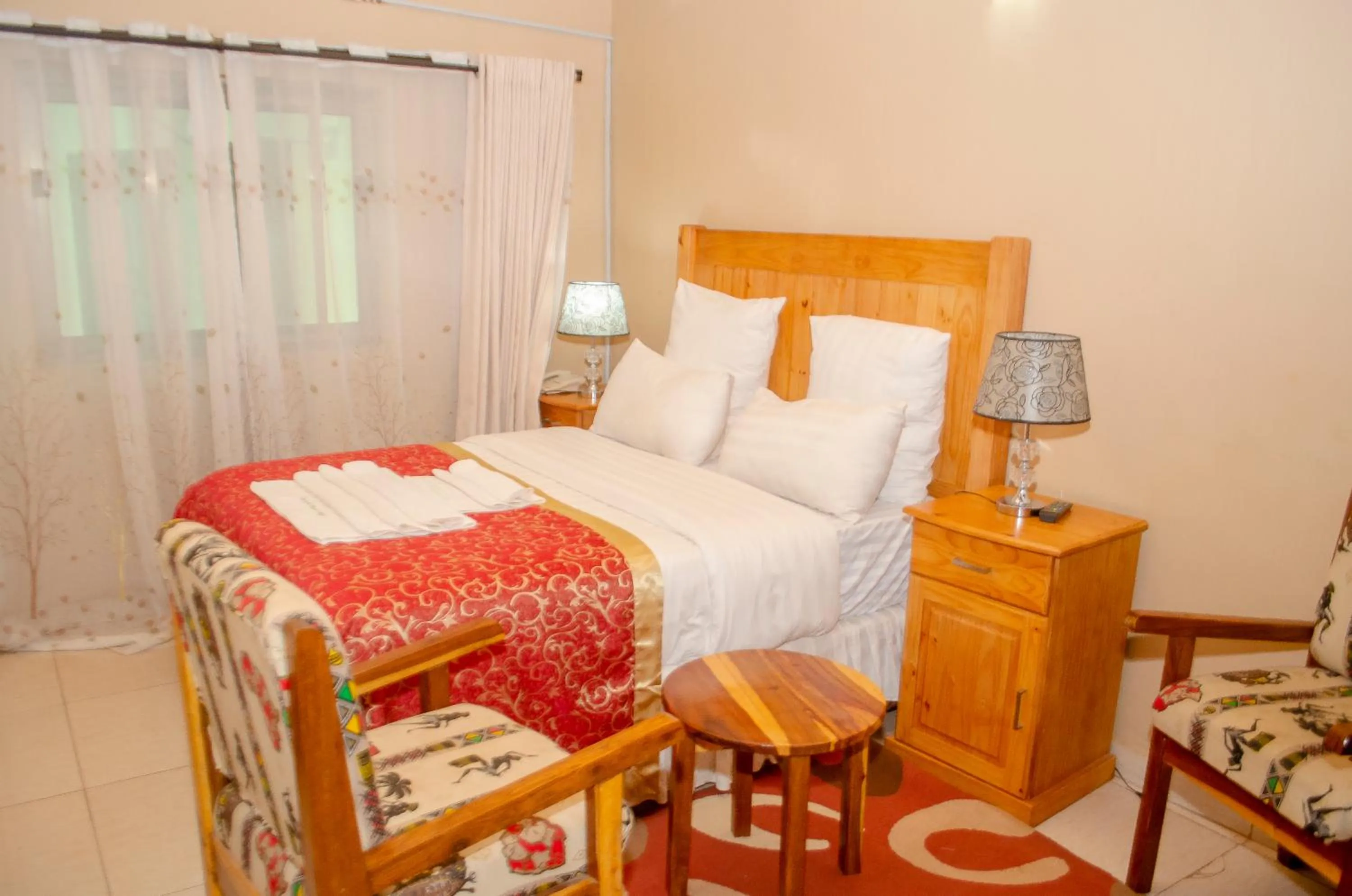 Bed in ROYAL SHALOM HOTEL