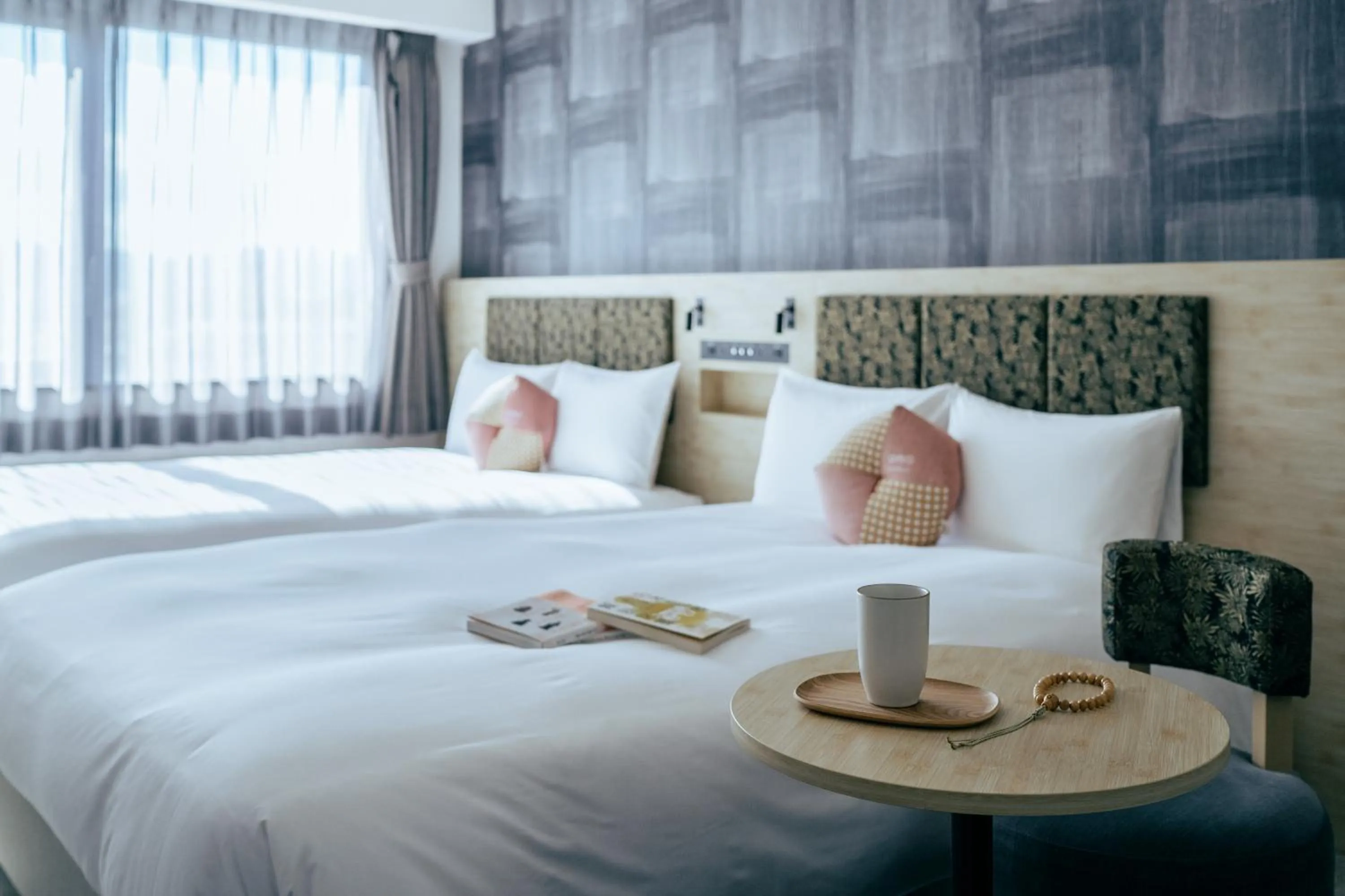 Bed in OMO3 Kyoto Toji by Hoshino Resorts