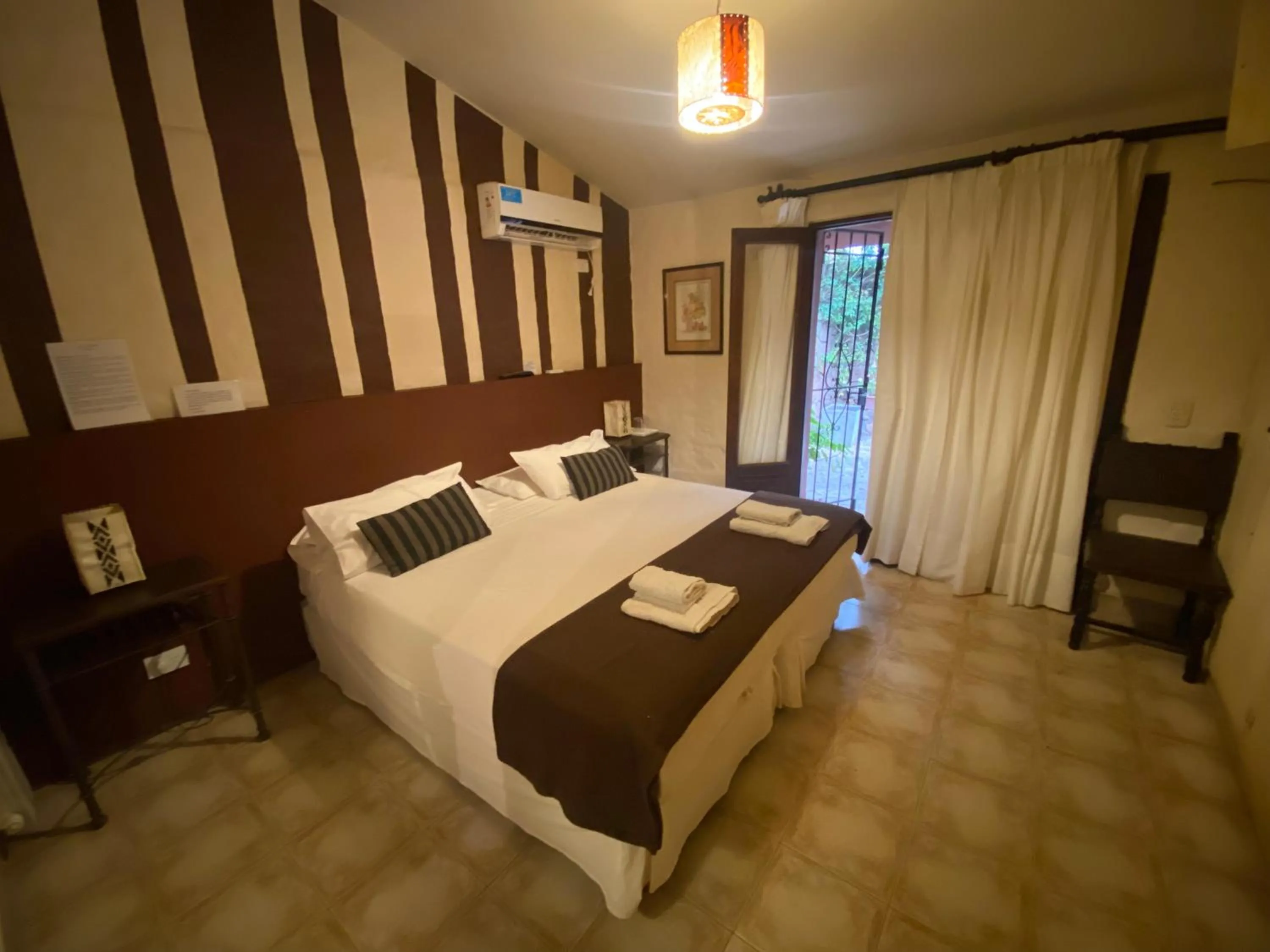 Bed in Hotel Las Chirimoyas