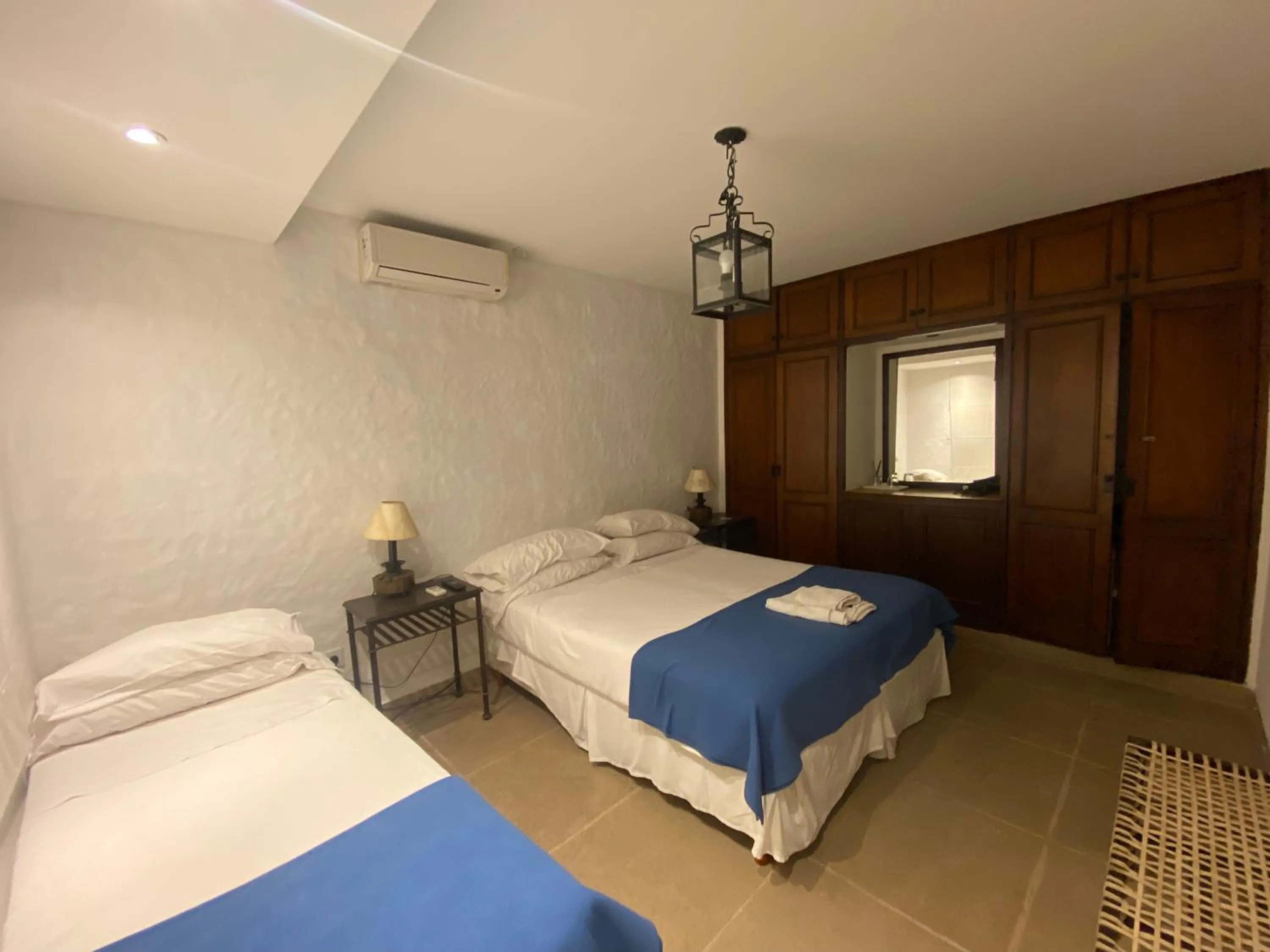 Bed in Hotel Las Chirimoyas