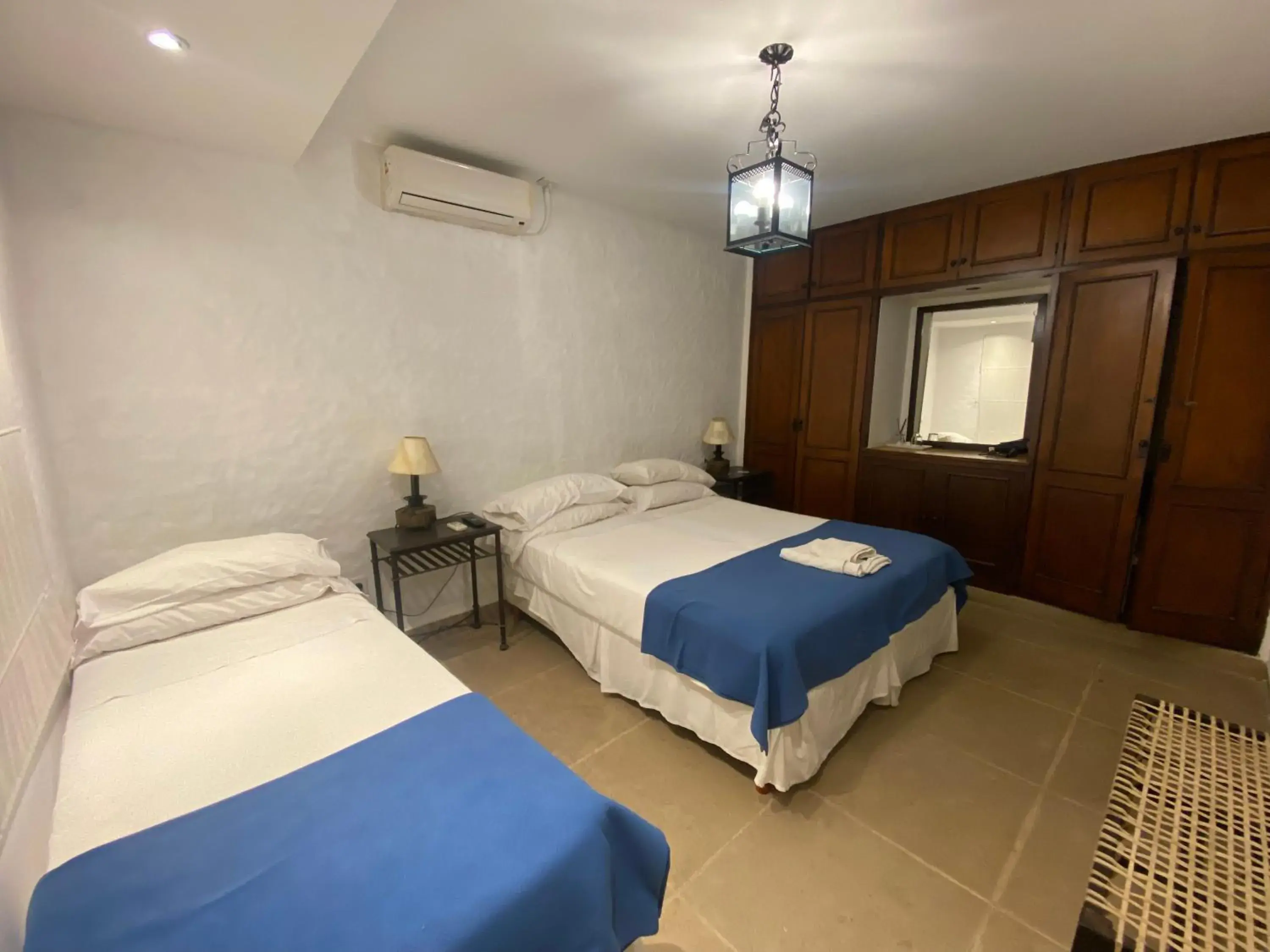 Triple Room in Hotel Las Chirimoyas Triple Room in Hotel Las Chirimoyas