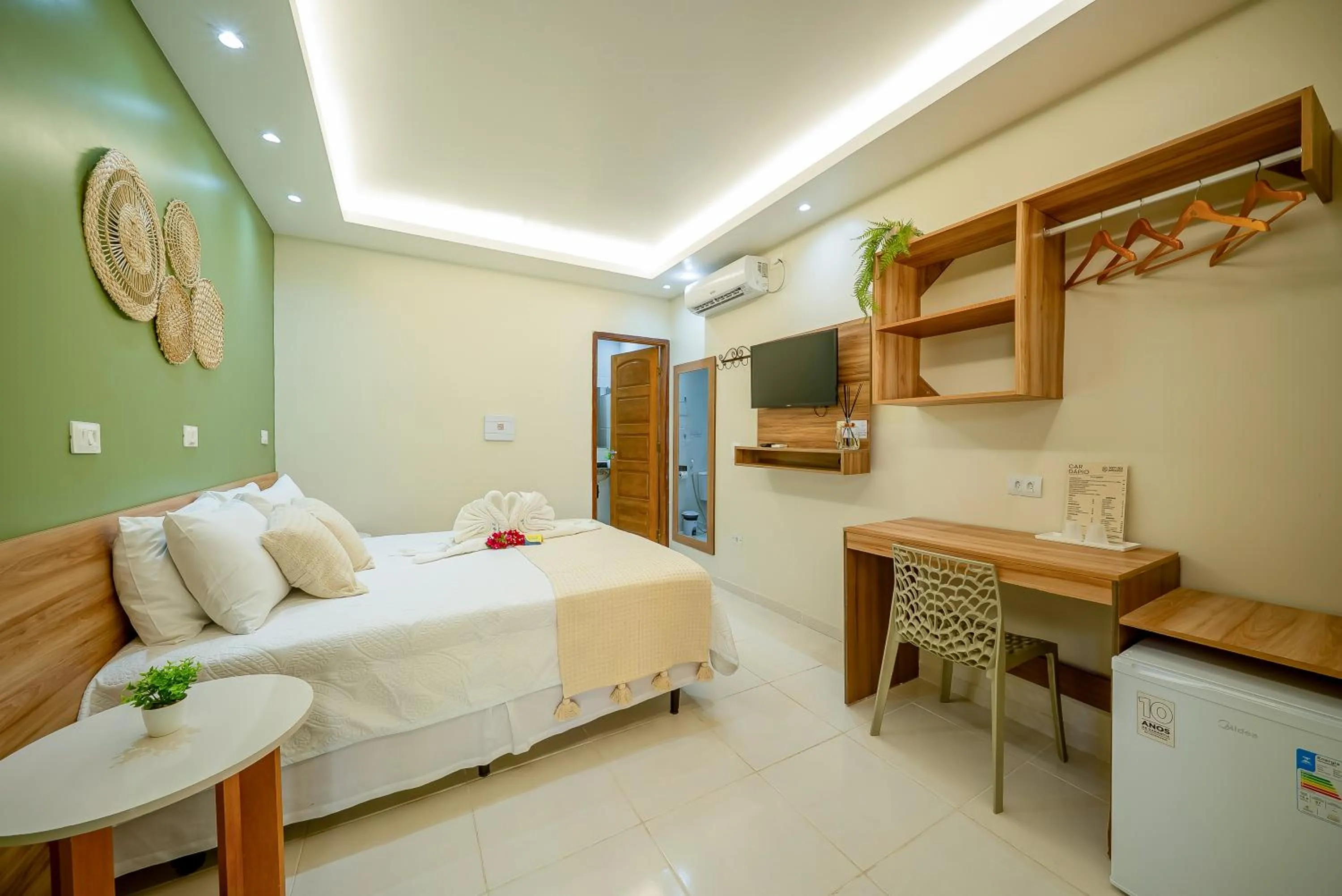 Bed in Pousada Som dos Pássaros