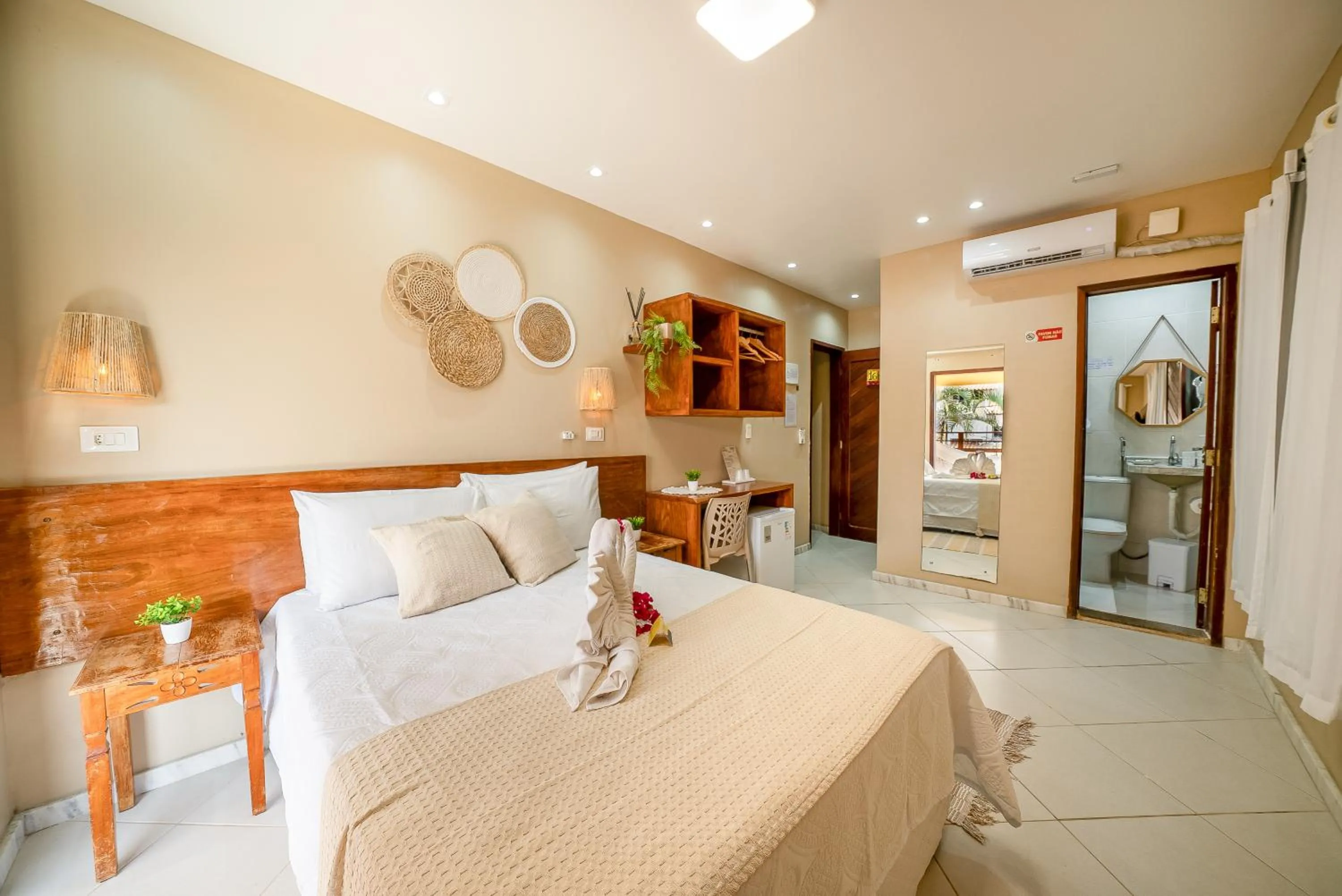 Bed in Pousada Som dos Pássaros