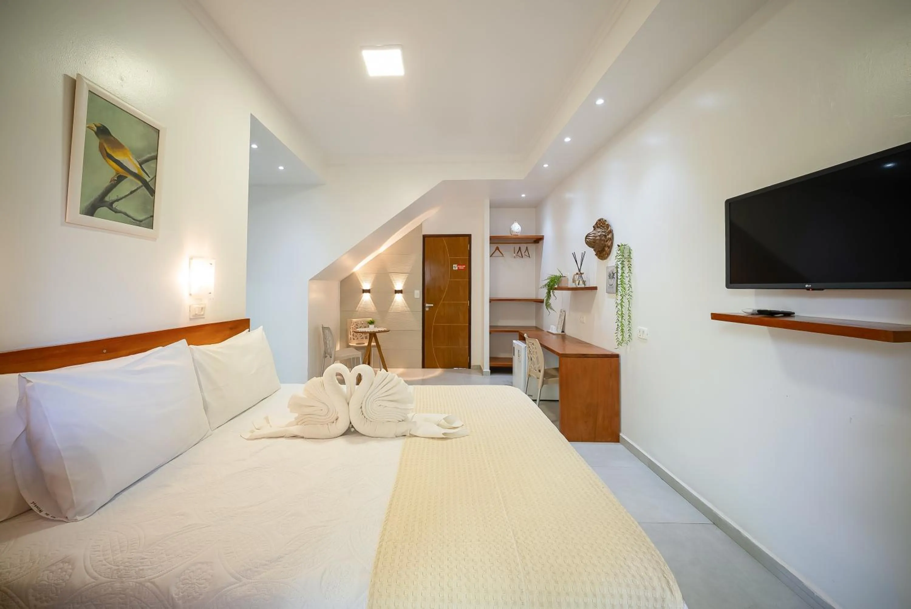 Bed in Pousada Som dos Pássaros