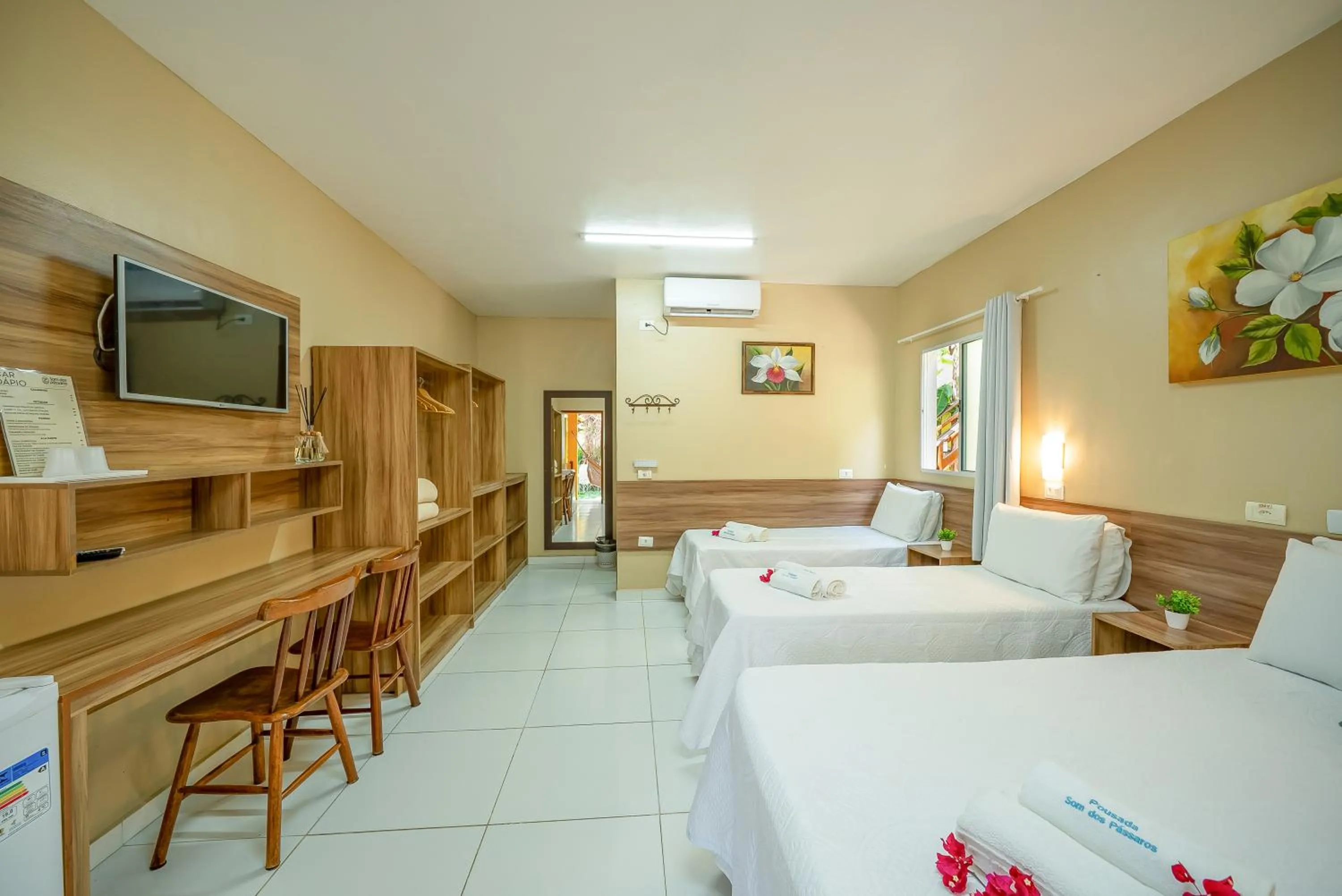 Bed in Pousada Som dos Pássaros