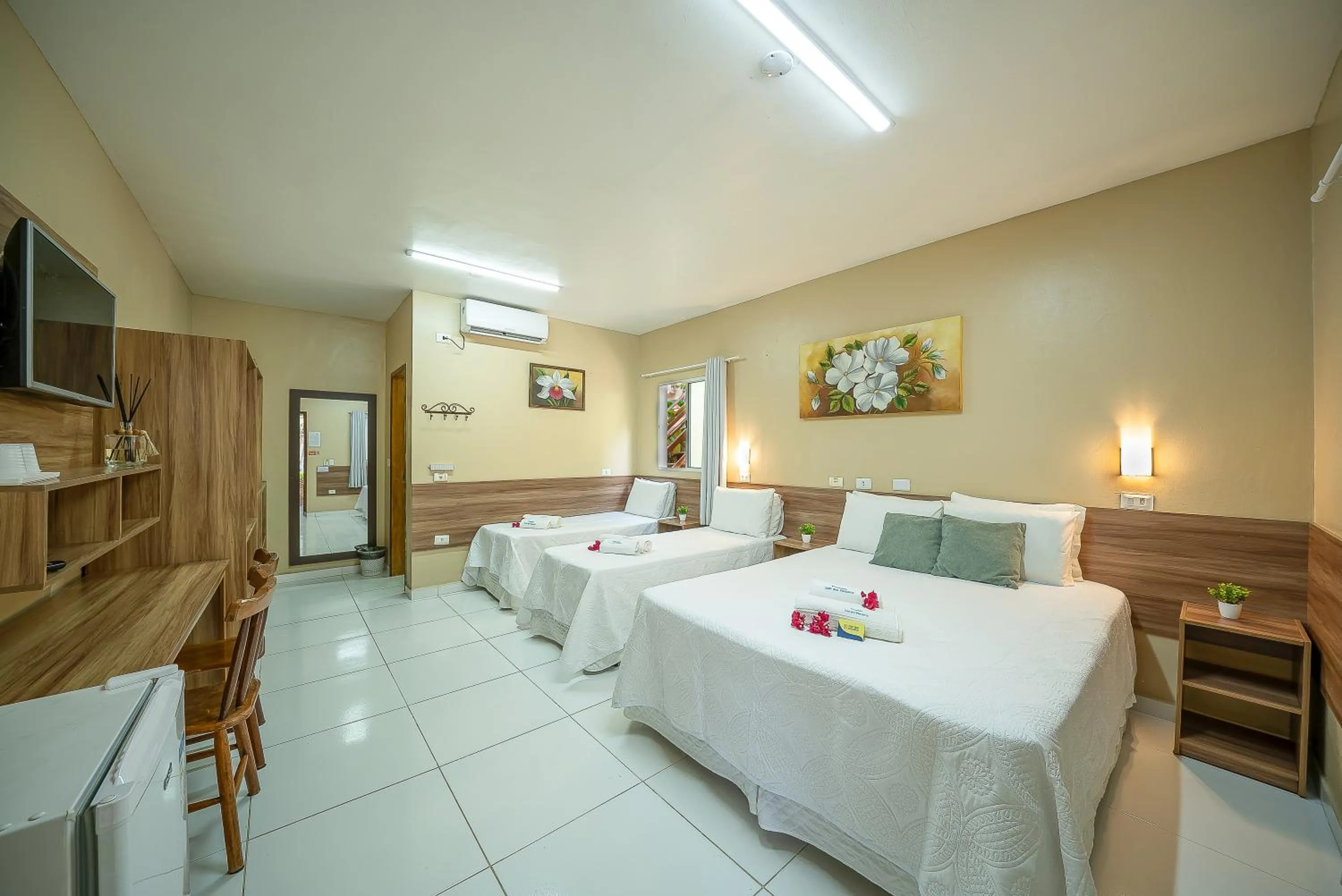 Bed in Pousada Som dos Pássaros