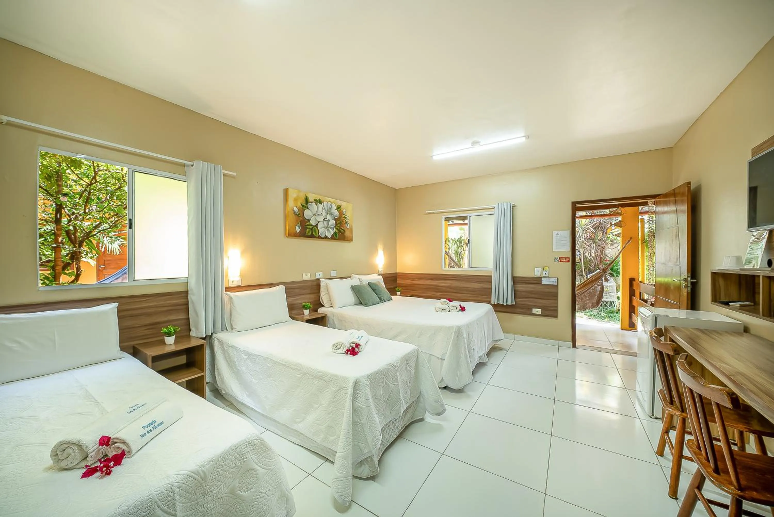 Bed in Pousada Som dos Pássaros