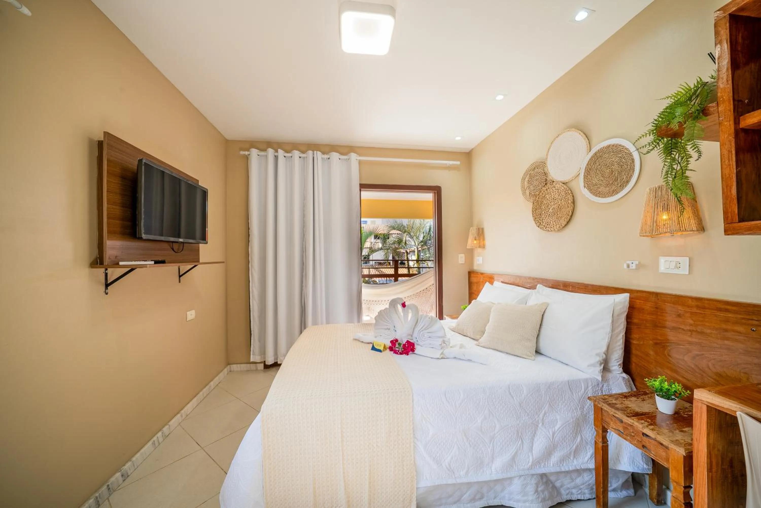 Bed in Pousada Som dos Pássaros