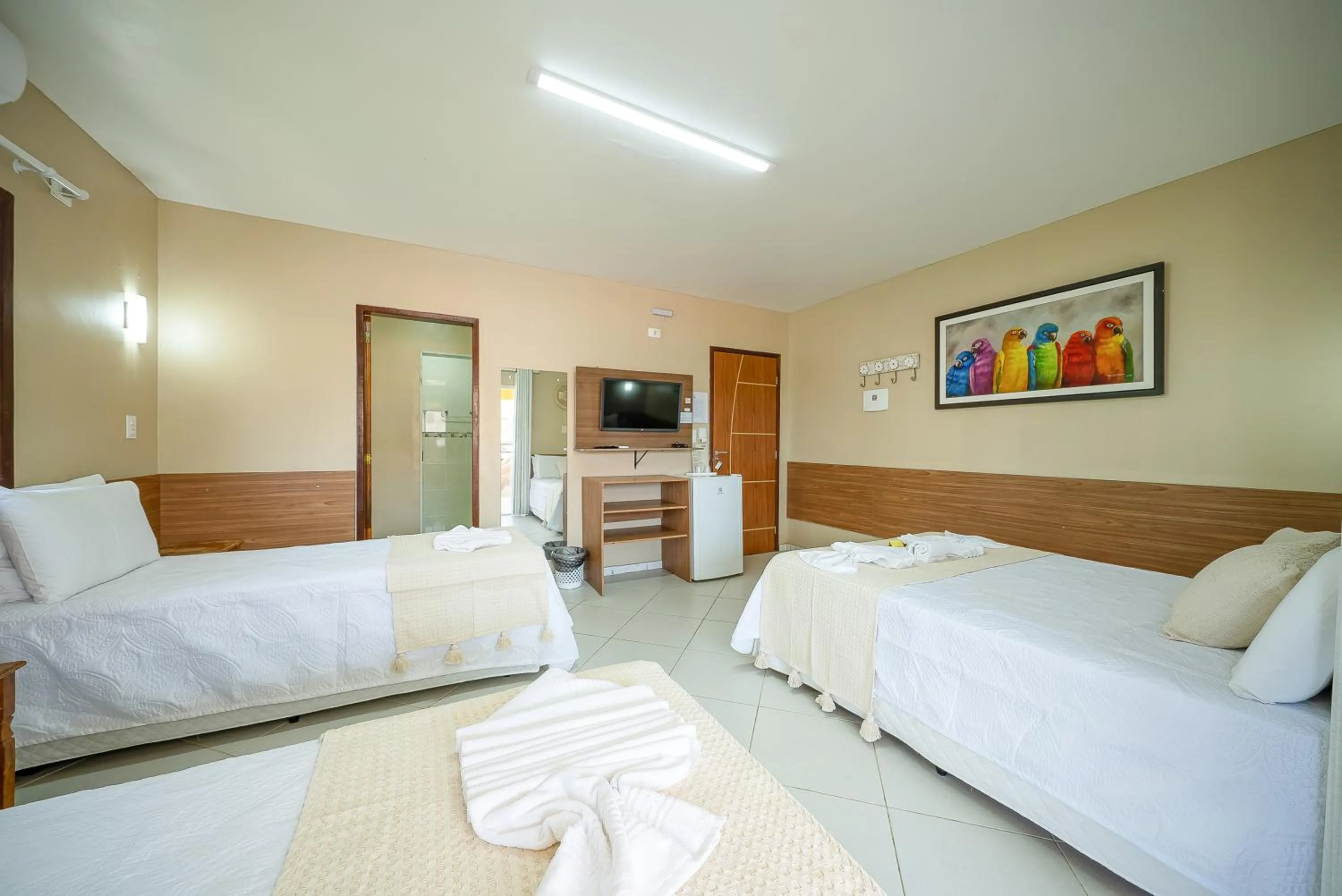 Bed in Pousada Som dos Pássaros