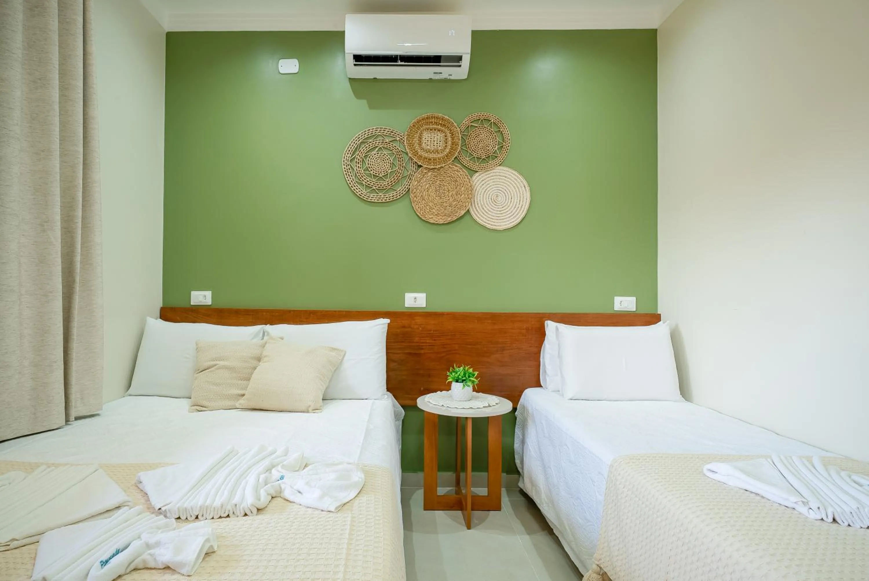 Bed in Pousada Som dos Pássaros