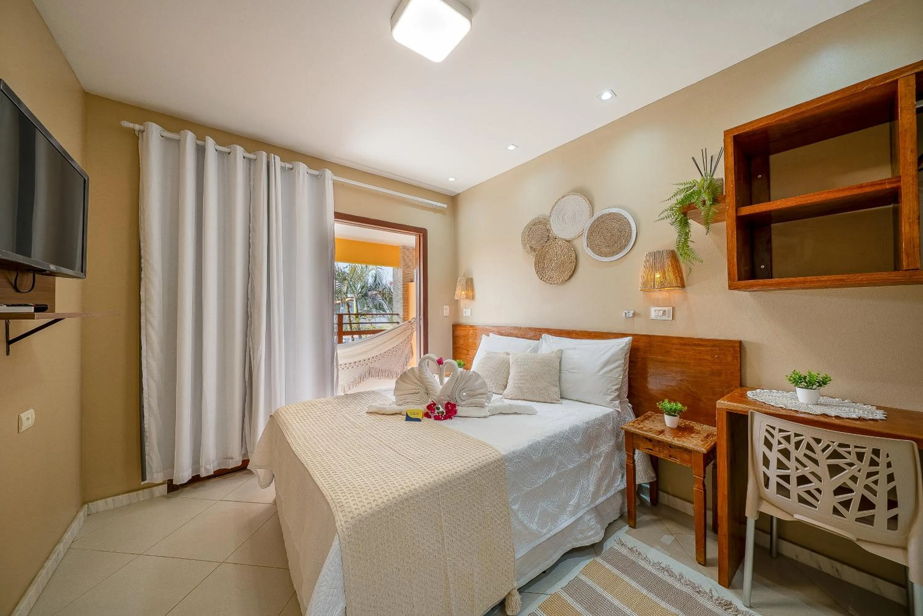 Bed in Pousada Som dos Pássaros