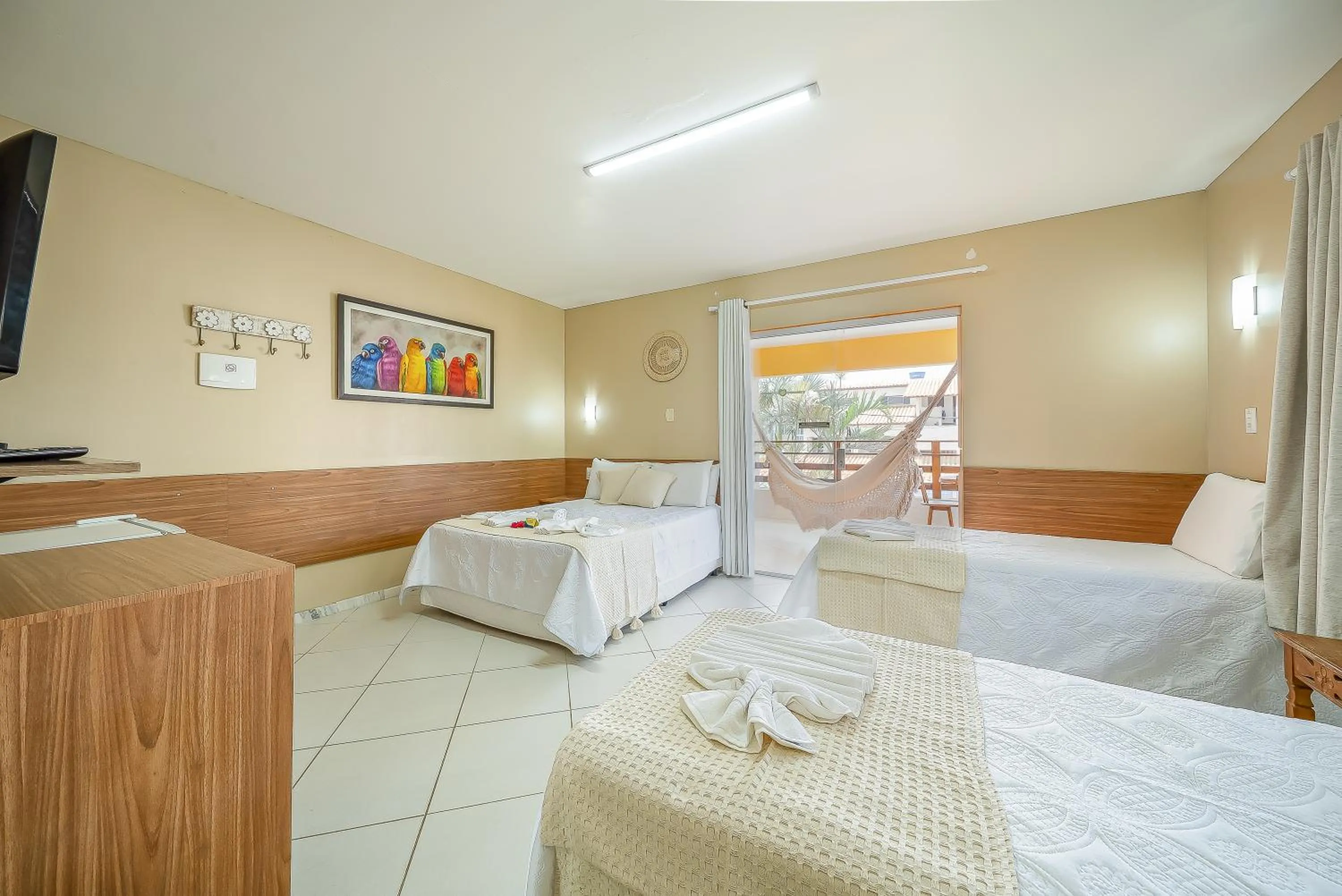 Bed in Pousada Som dos Pássaros