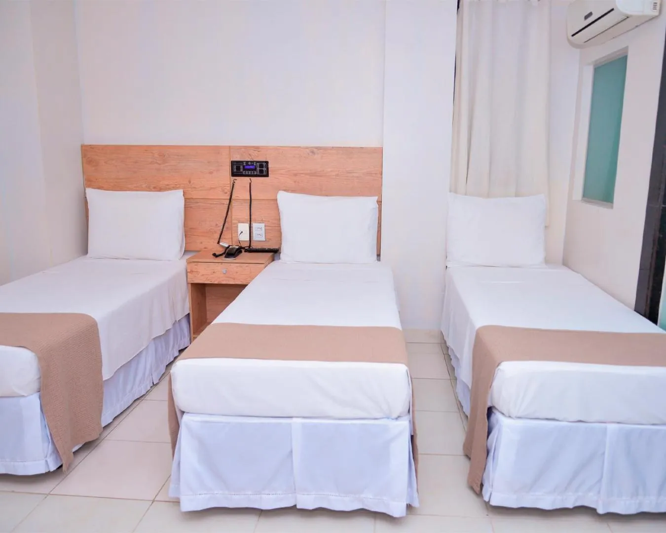 Bed in Hotel Sempre Executive