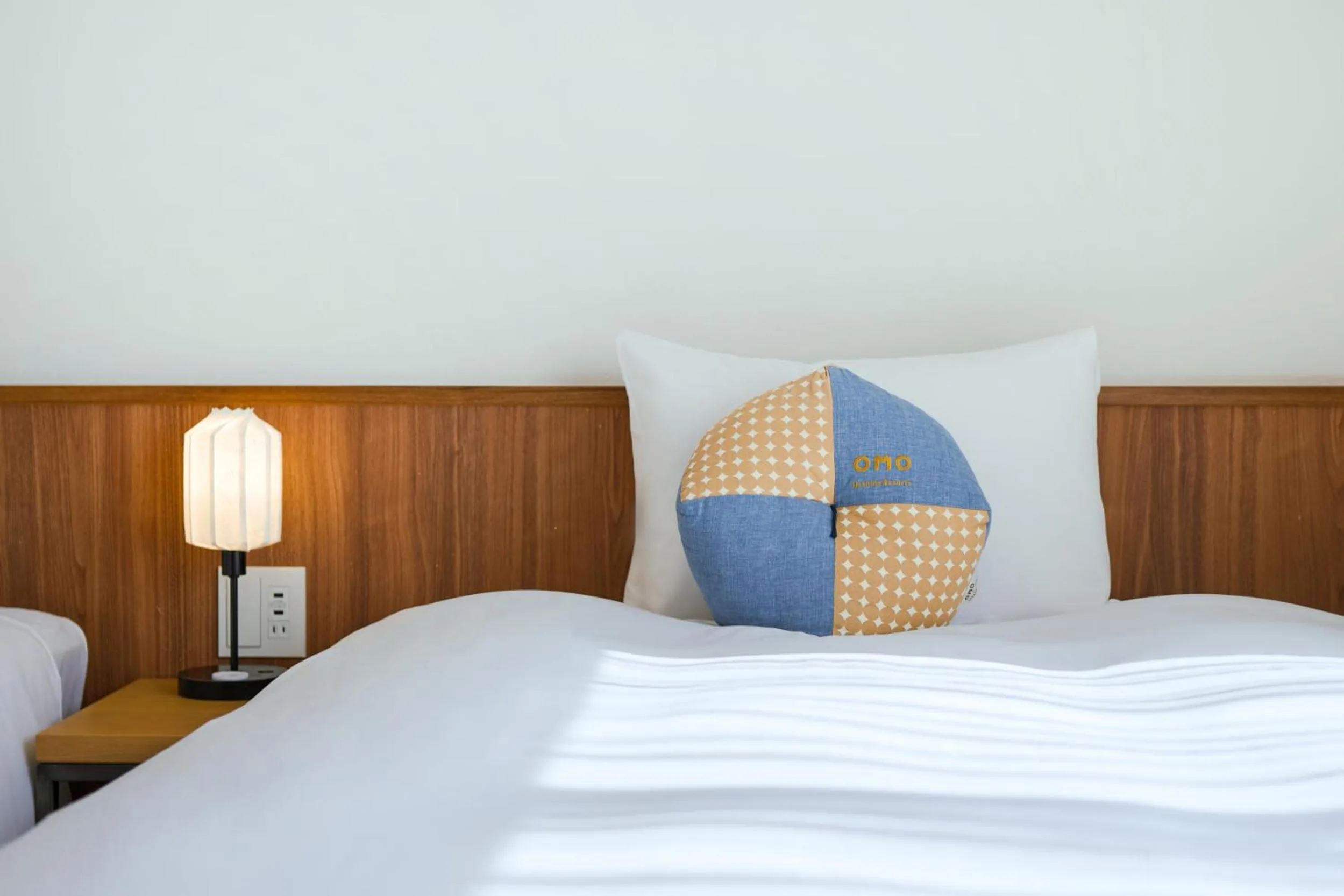 Bed in OMO5 Kyoto Sanjo by Hoshino Resorts