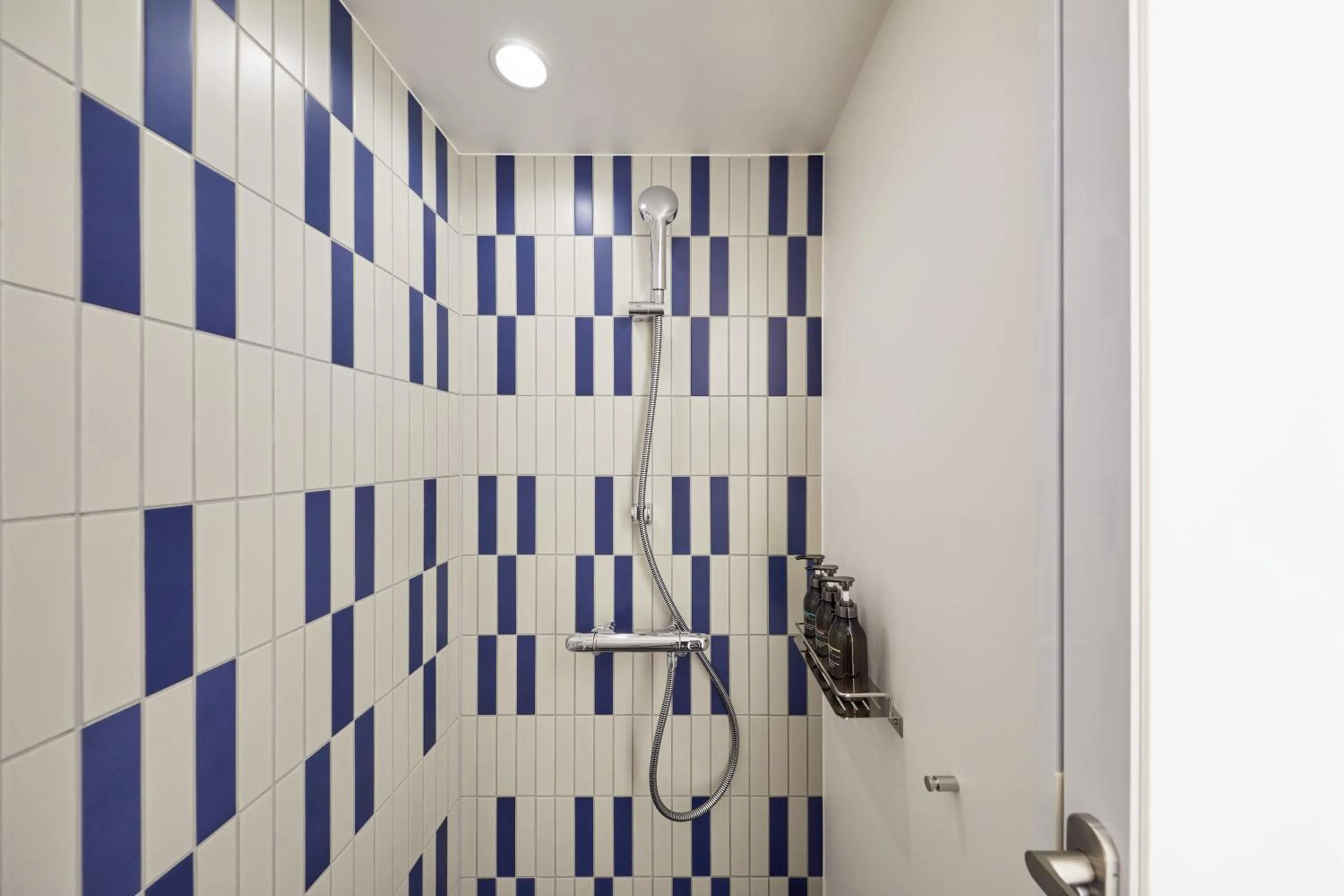 Shower in OMO5 Okinawa Naha by Hoshino Resorts