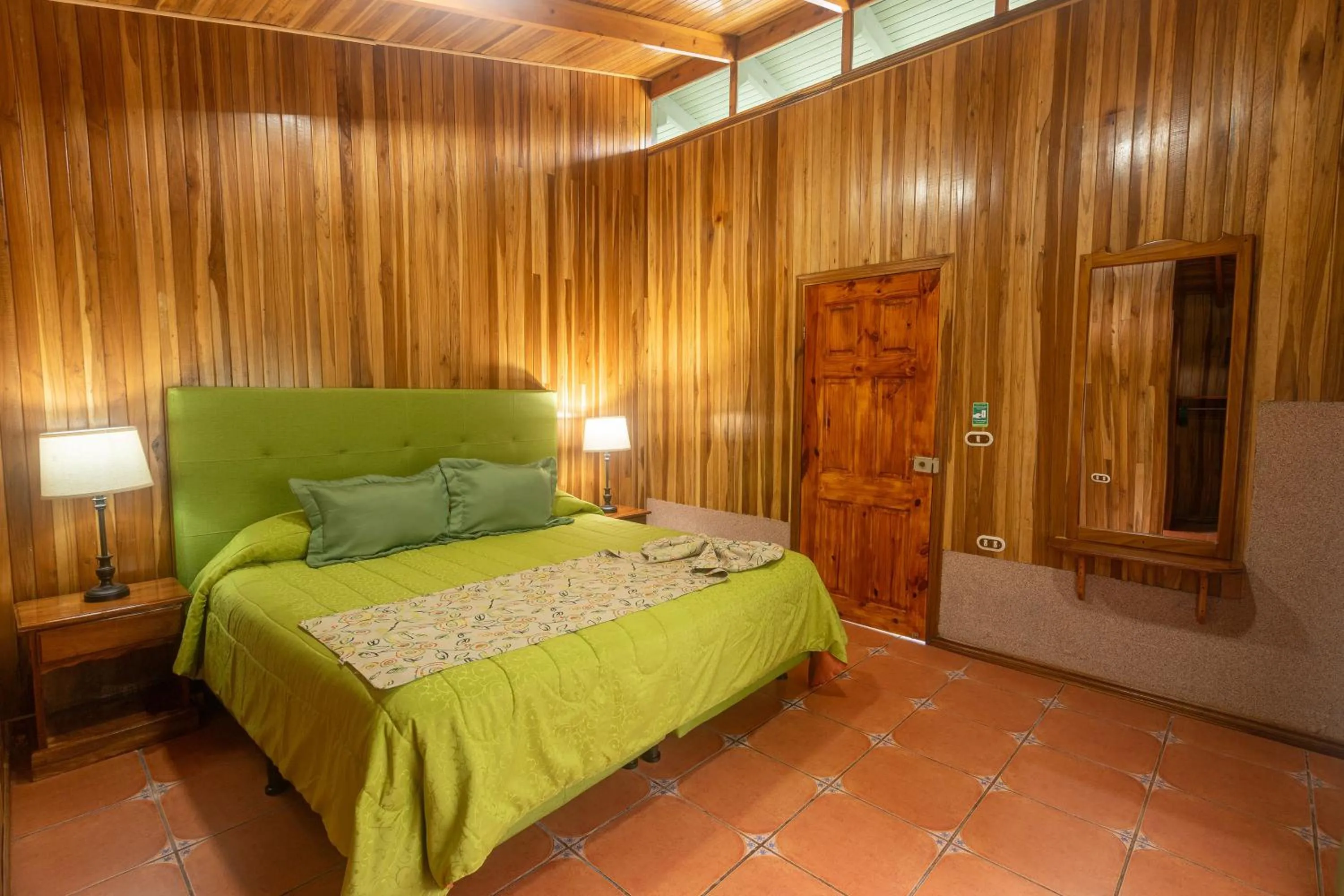 Bed in Los Pinos Cabins & Reserve