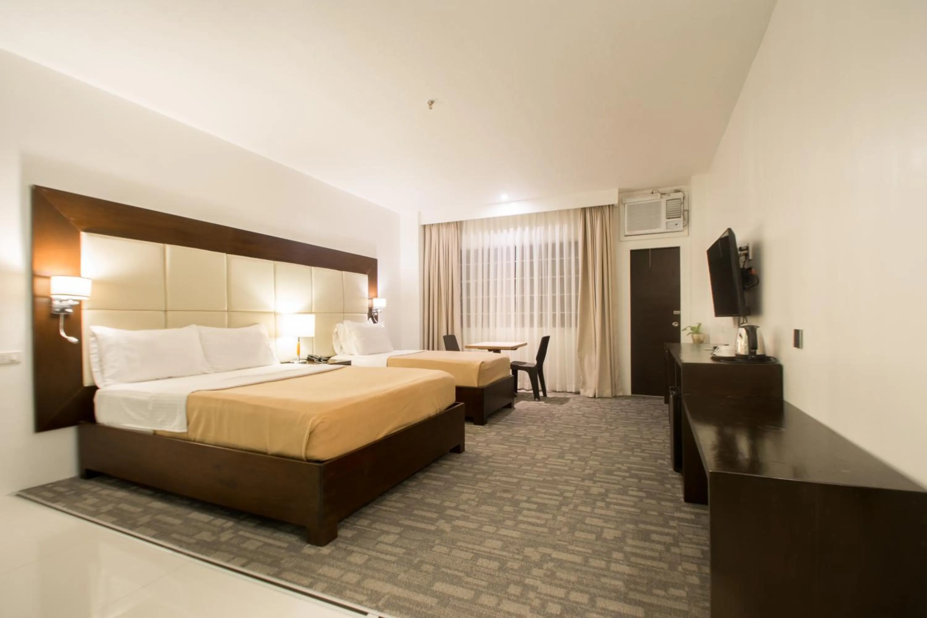 Bed in MARZON HOTEL KALIBO