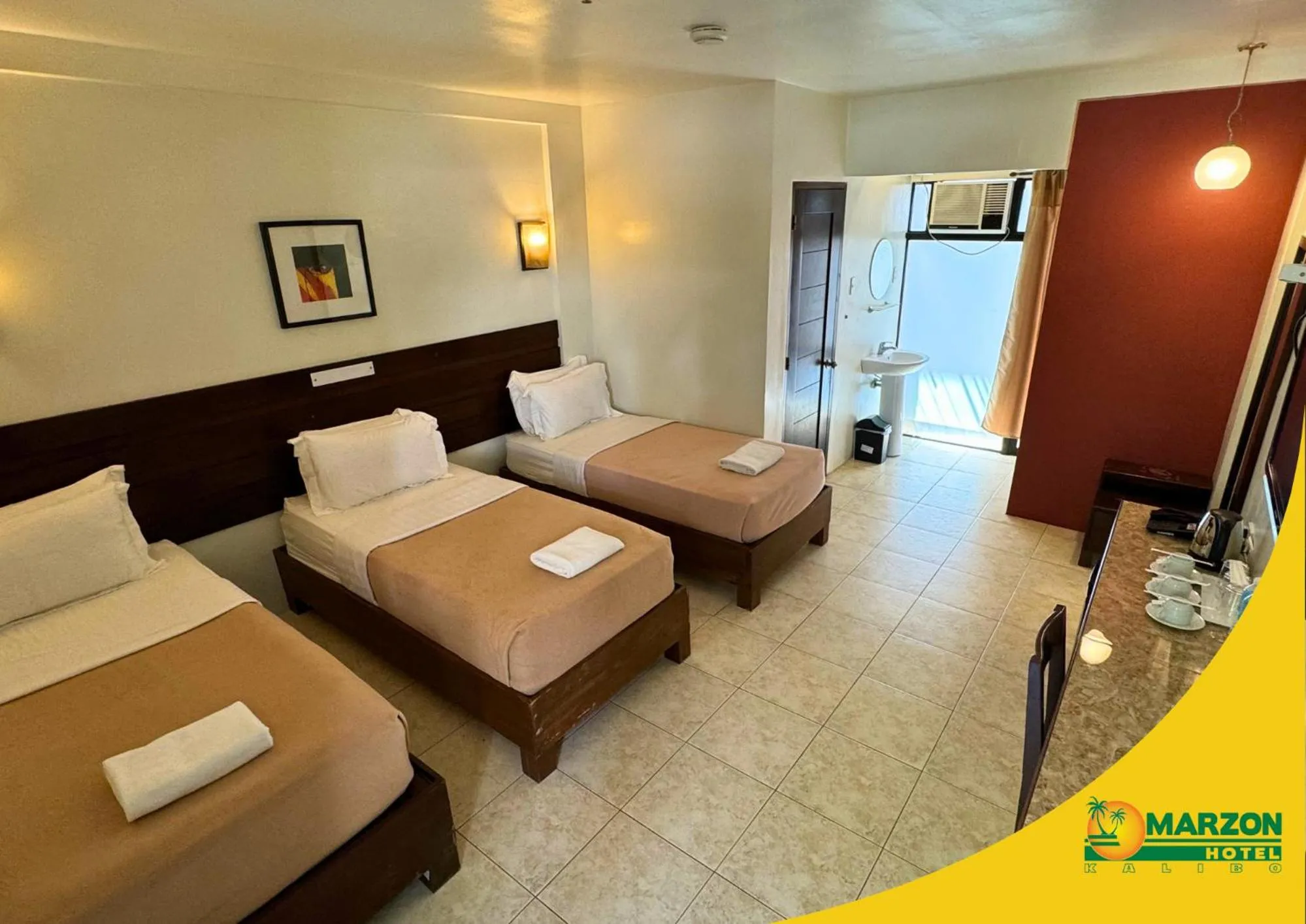 Bed in MARZON HOTEL KALIBO