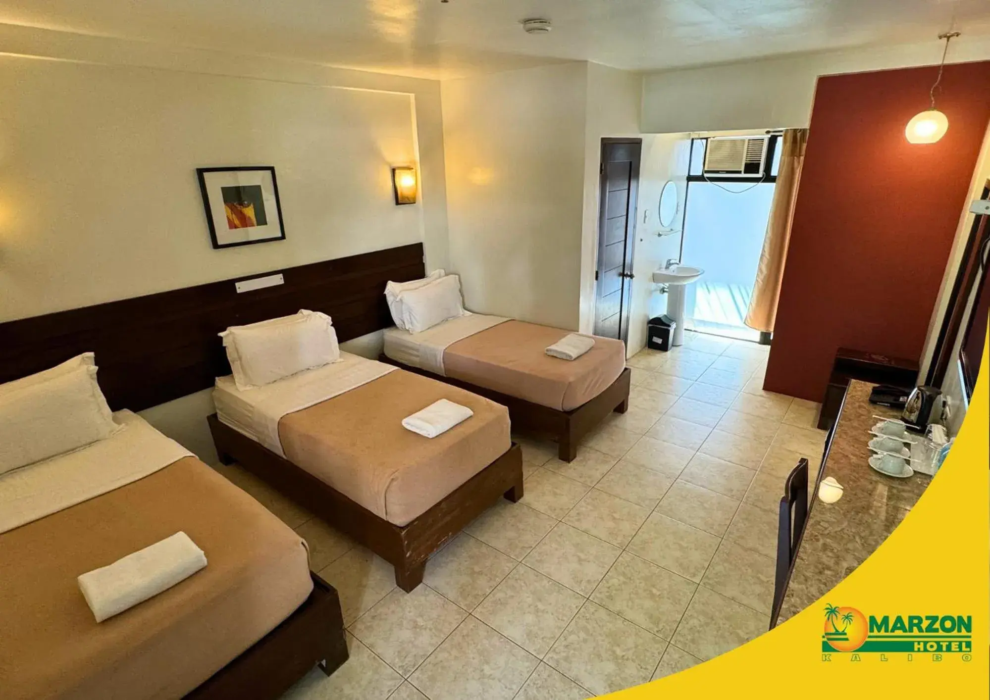 Bed in MARZON HOTEL KALIBO Bed in MARZON HOTEL KALIBO