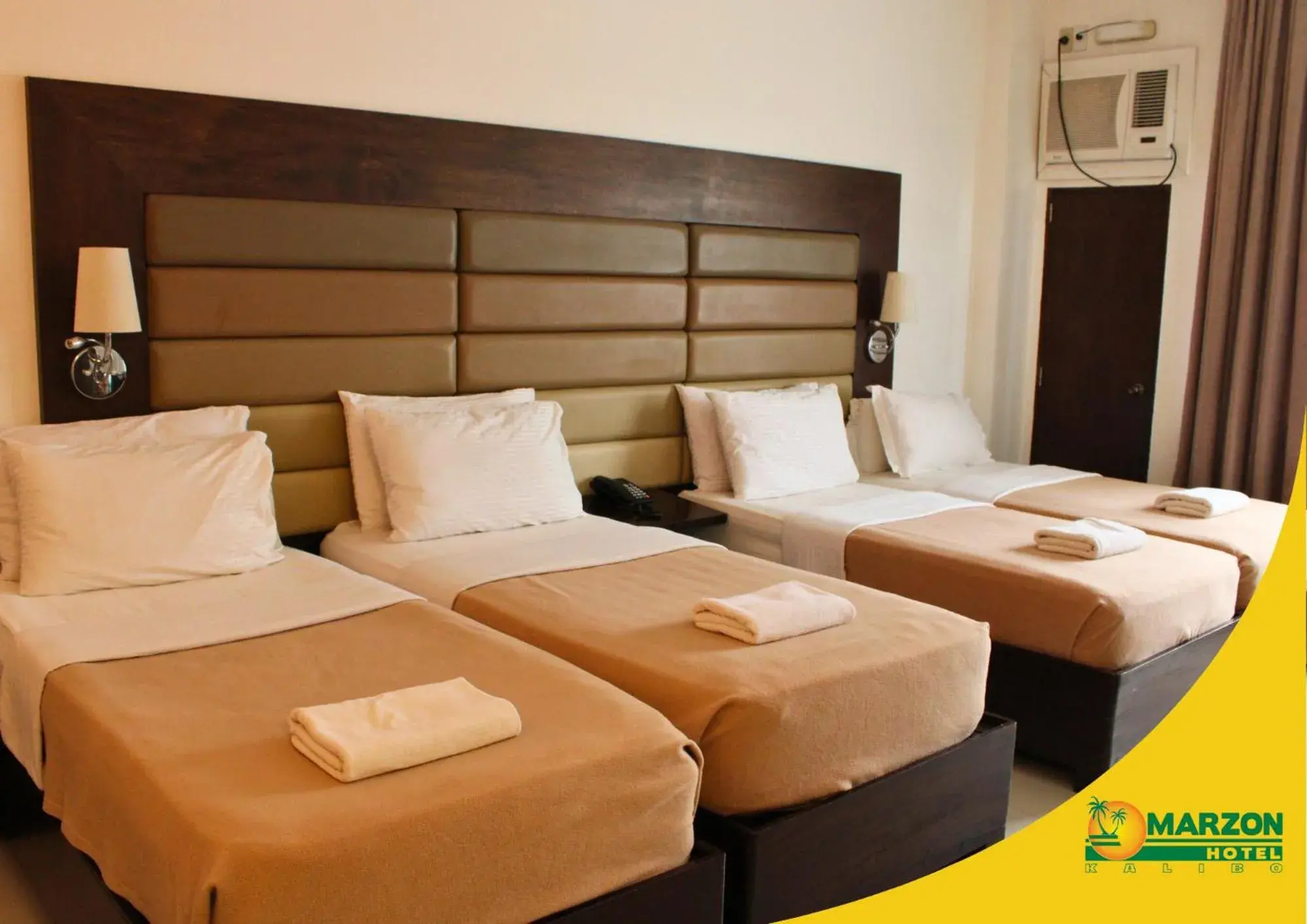 Bed in MARZON HOTEL KALIBO Bed in MARZON HOTEL KALIBO