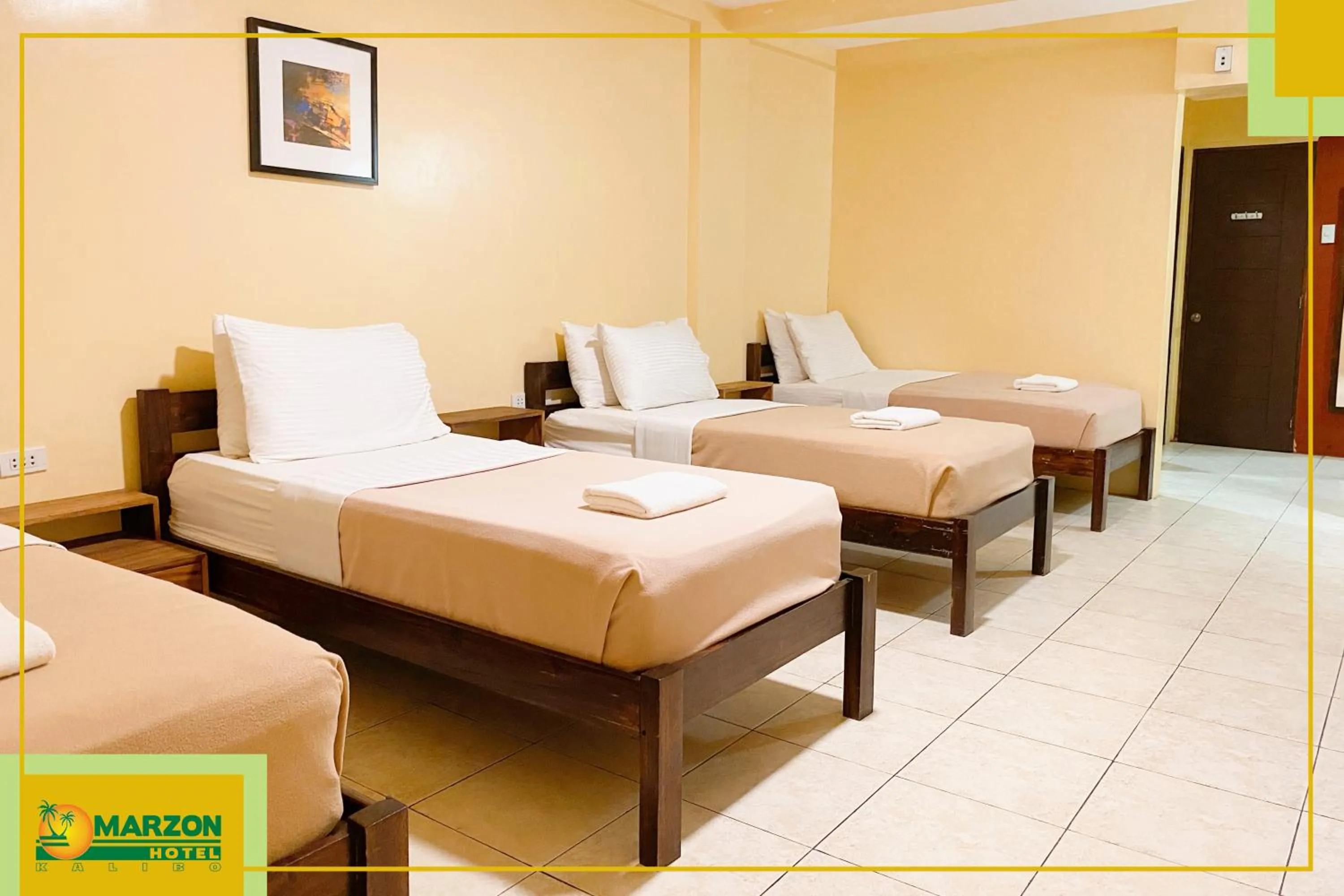 Bed in MARZON HOTEL KALIBO