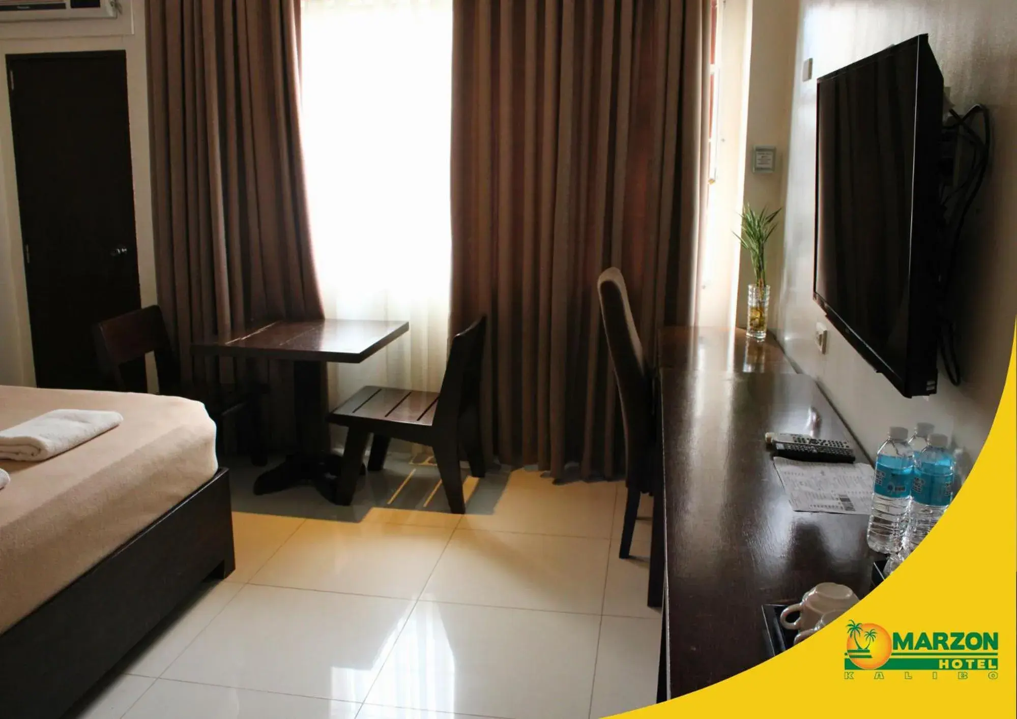 TV and multimedia, Bed in MARZON HOTEL KALIBO TV and multimedia, Bed in MARZON HOTEL KALIBO