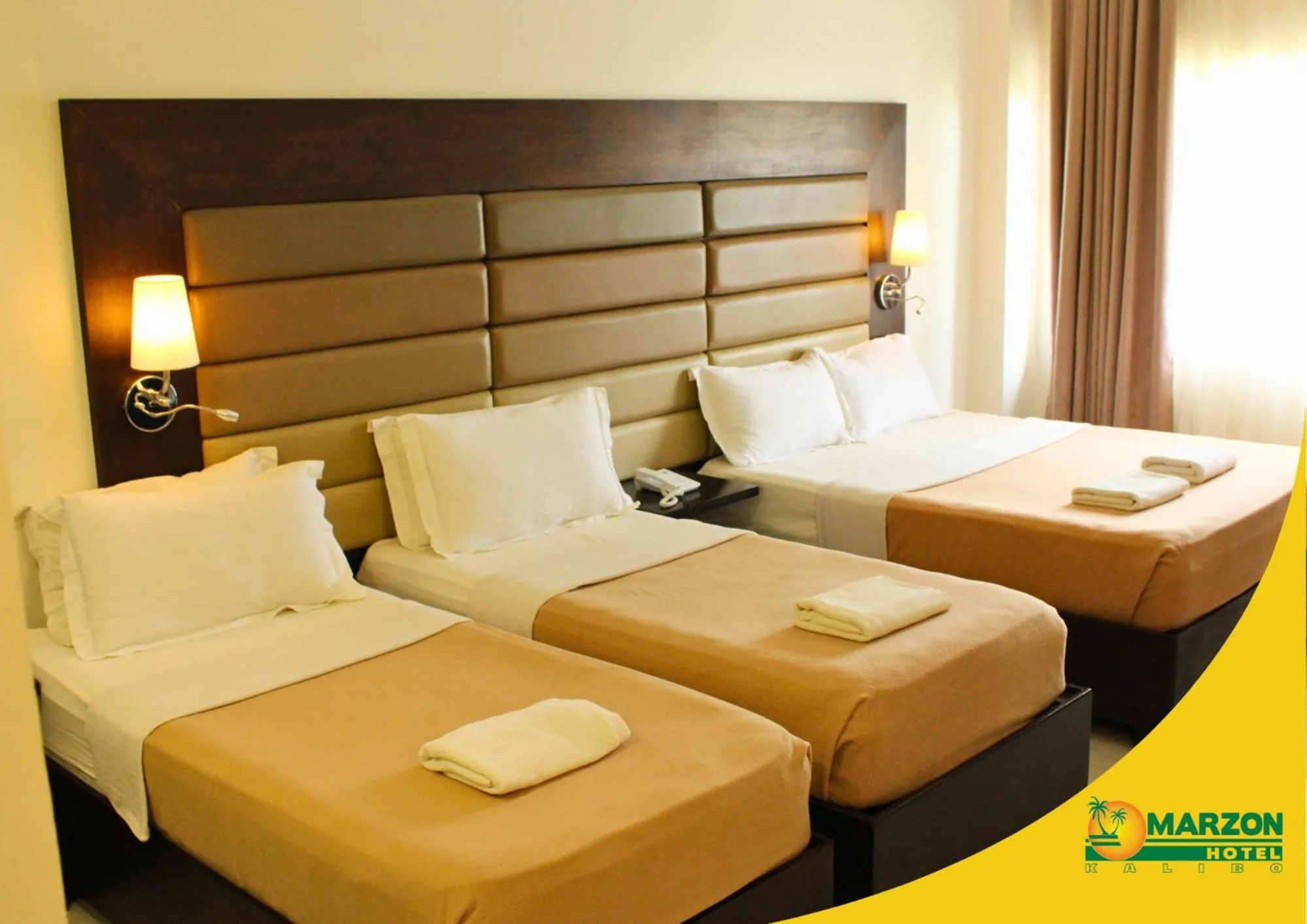 Bed in MARZON HOTEL KALIBO