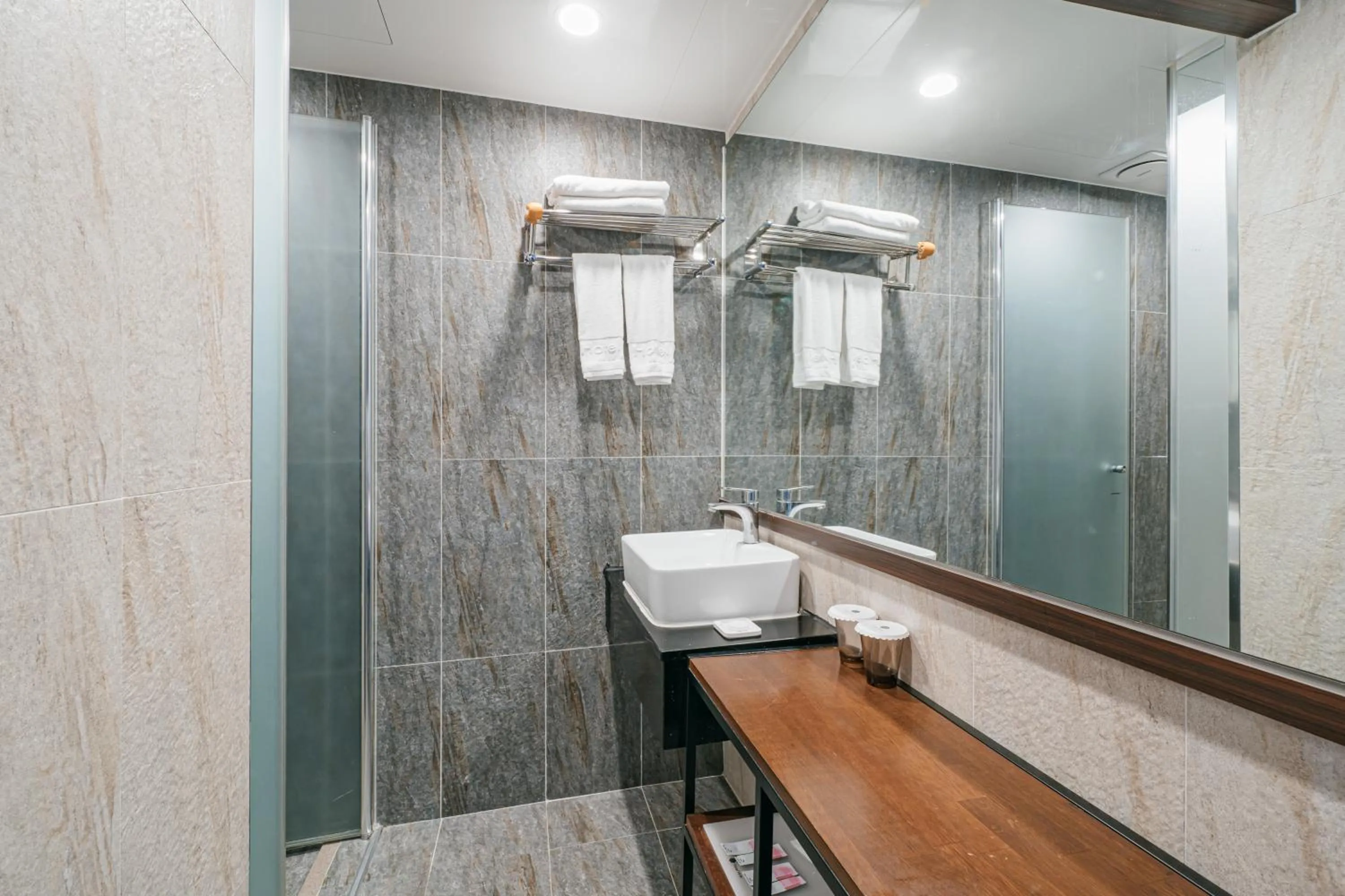 Bathroom in Hotel With City