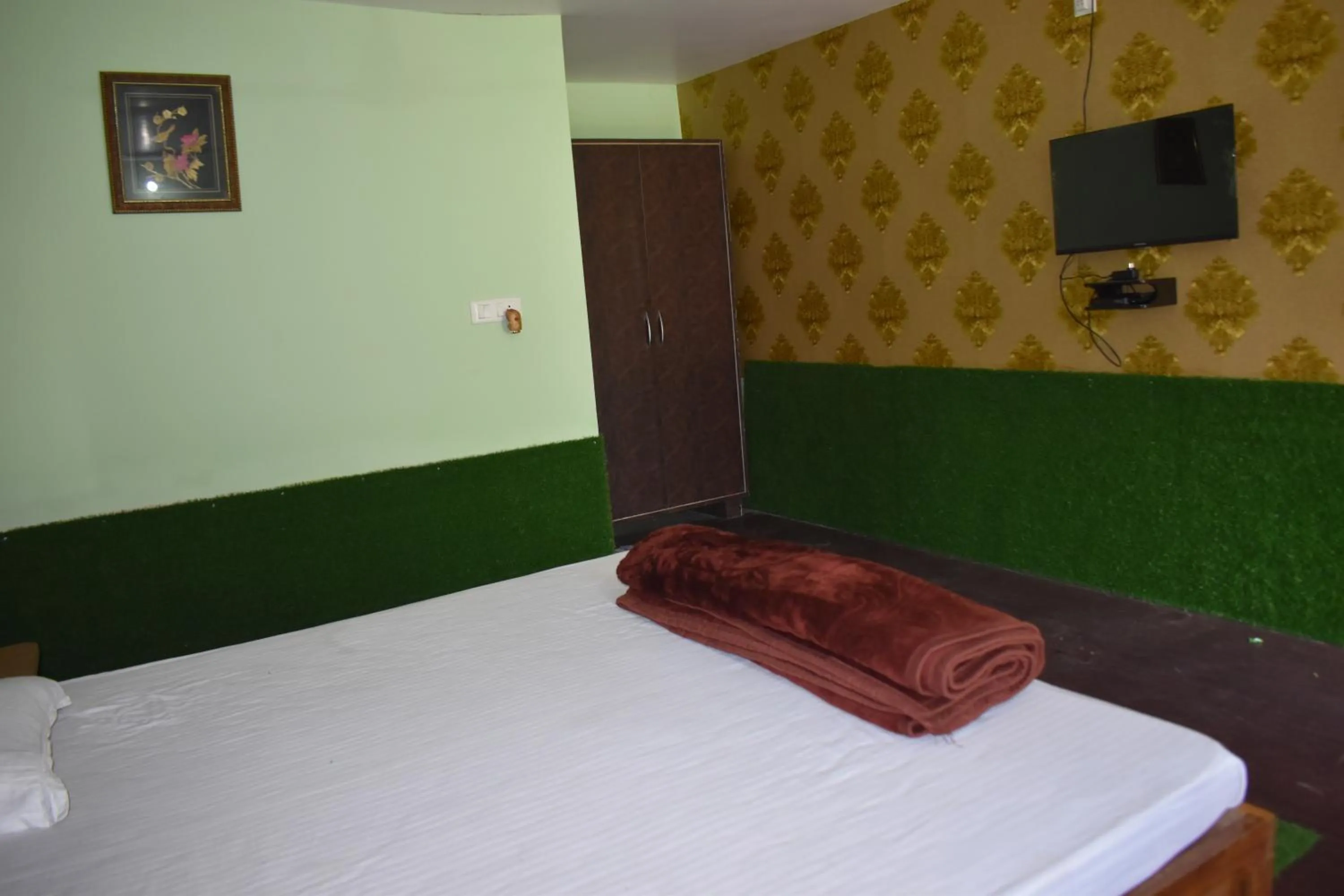 Bed in Kanikasundari Home Stay
