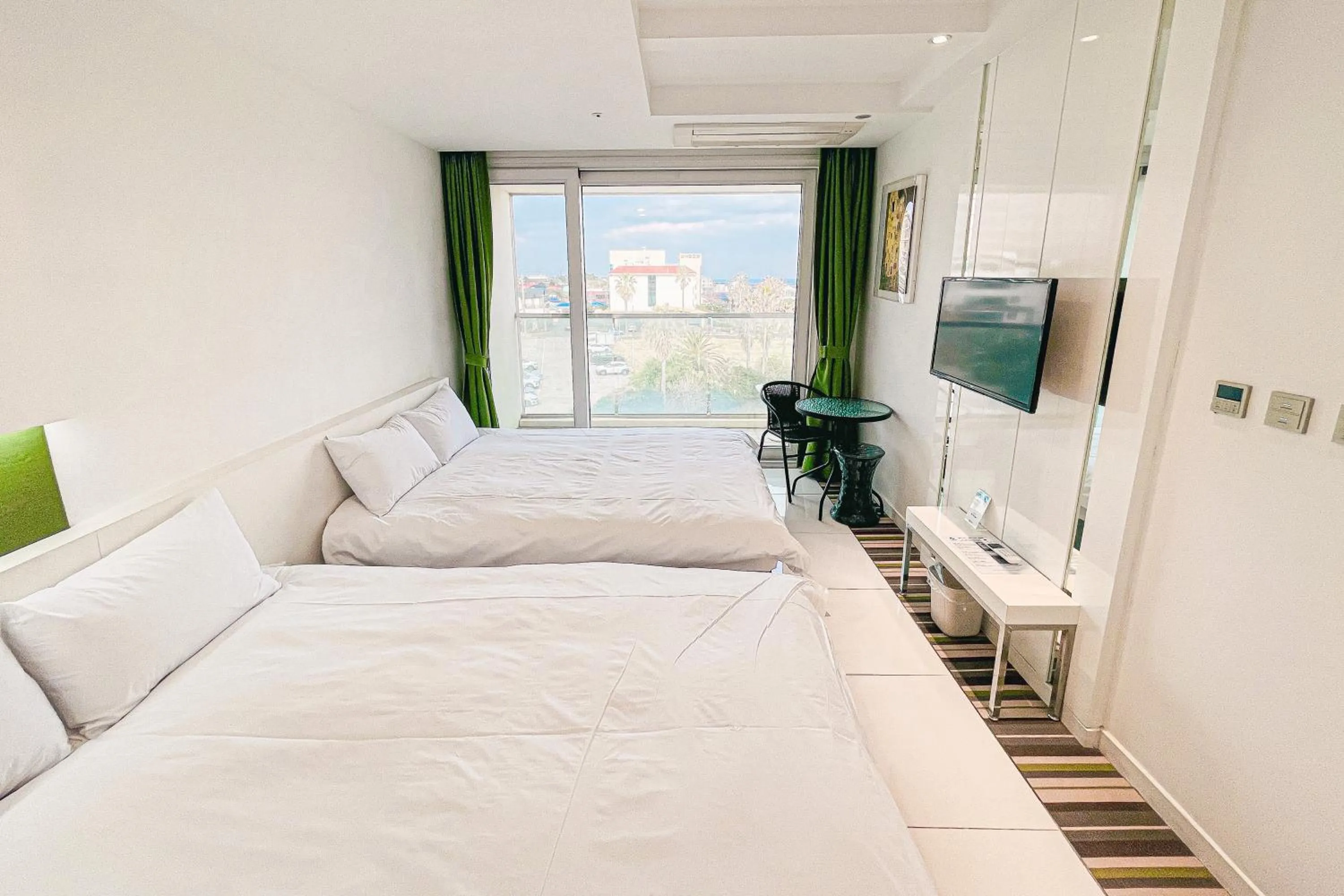 Bed in Hamdeok Beach Stay Jeju