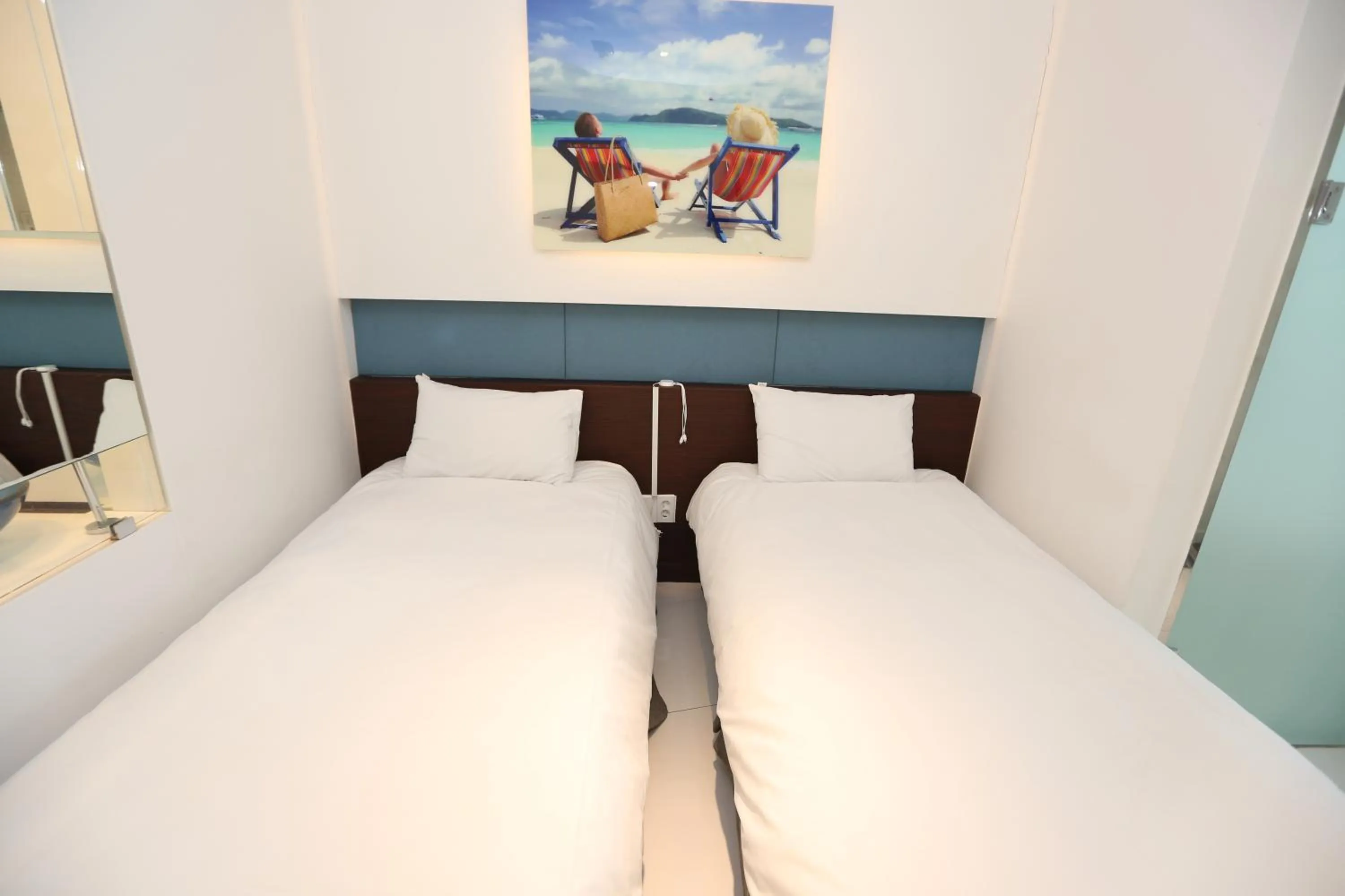Bed in Hamdeok Beach Stay Jeju