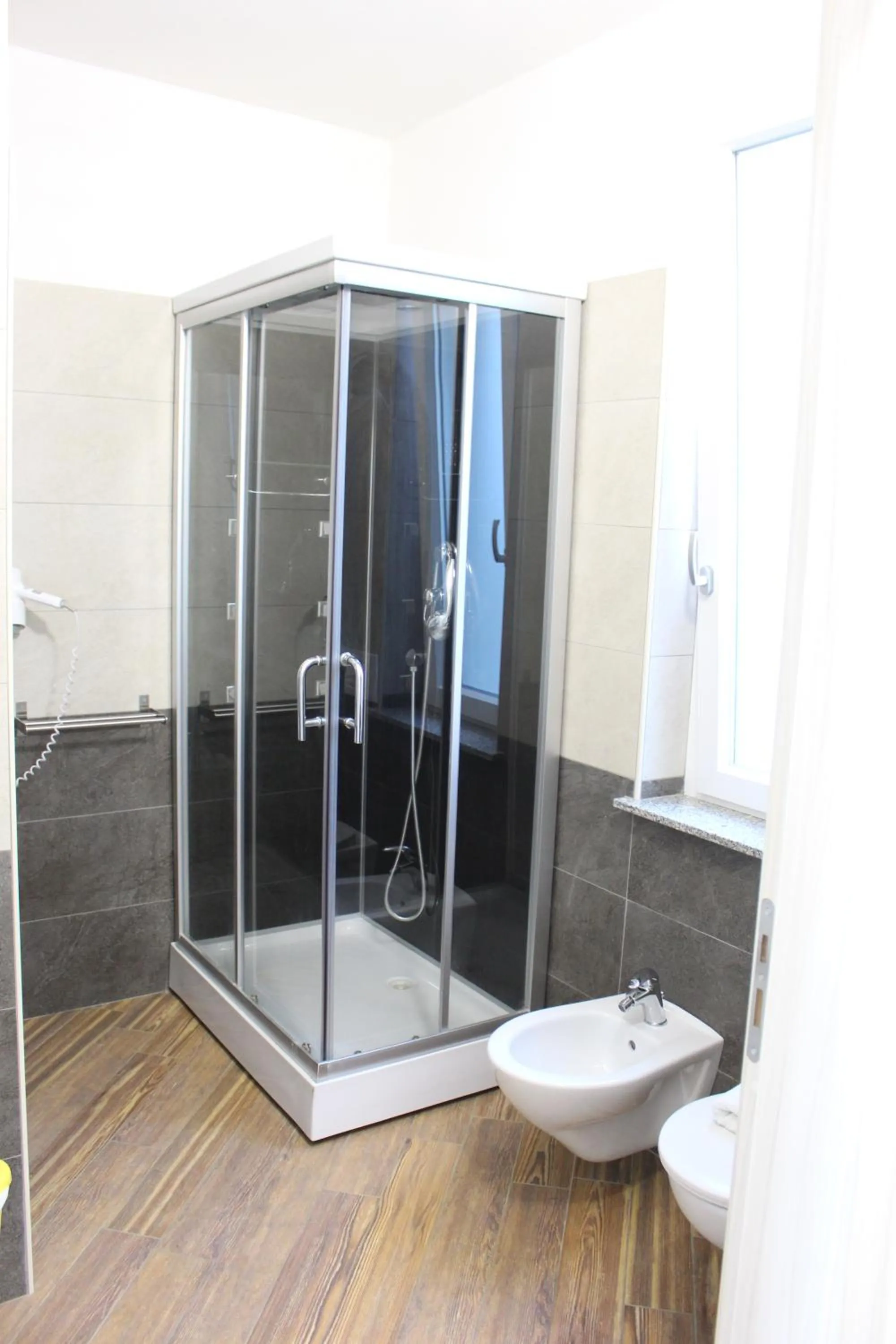 Bathroom in Residence Hotel La Taverna